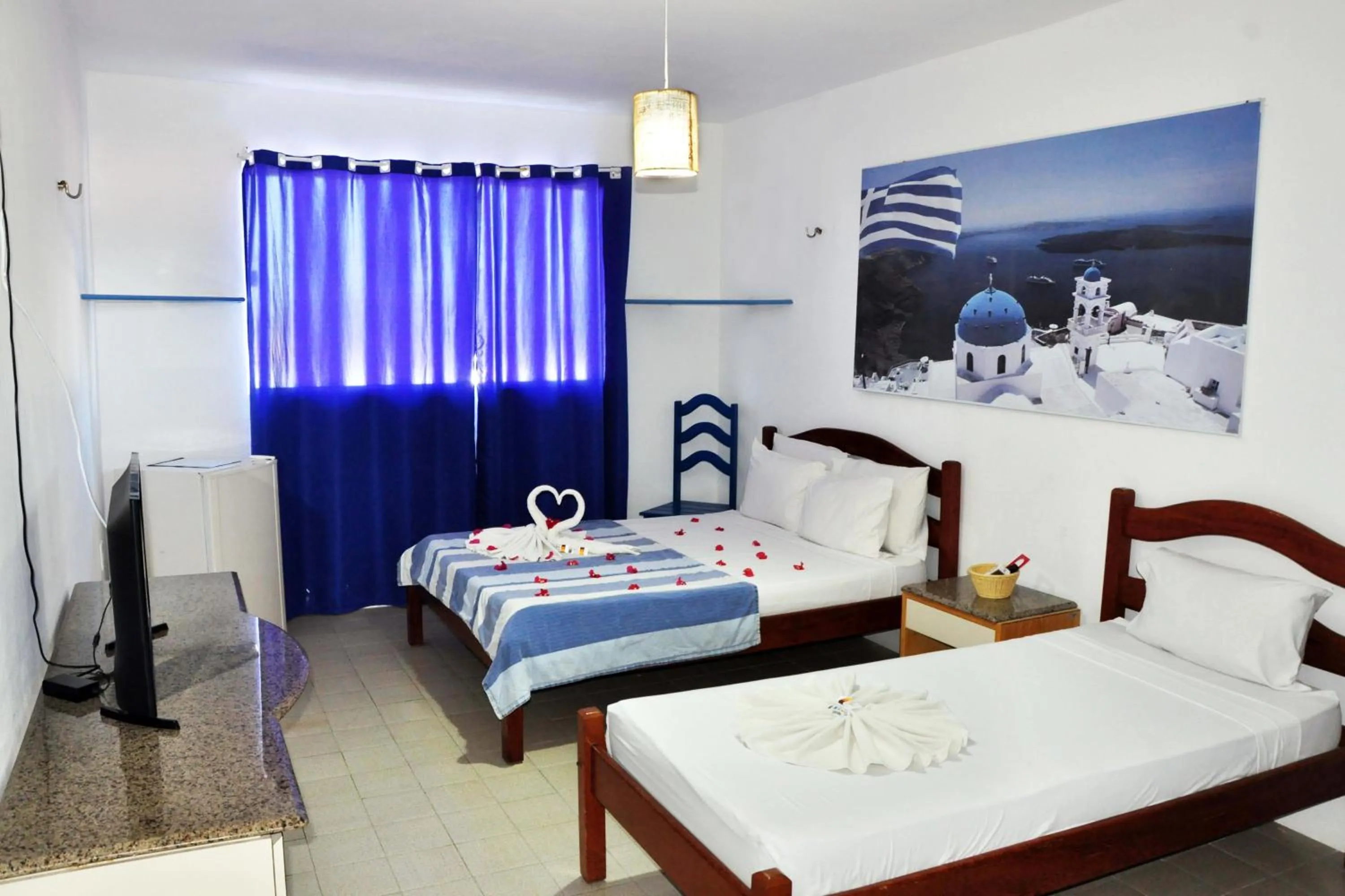 Photo of the whole room, Bed in La Suite Praia Hotel