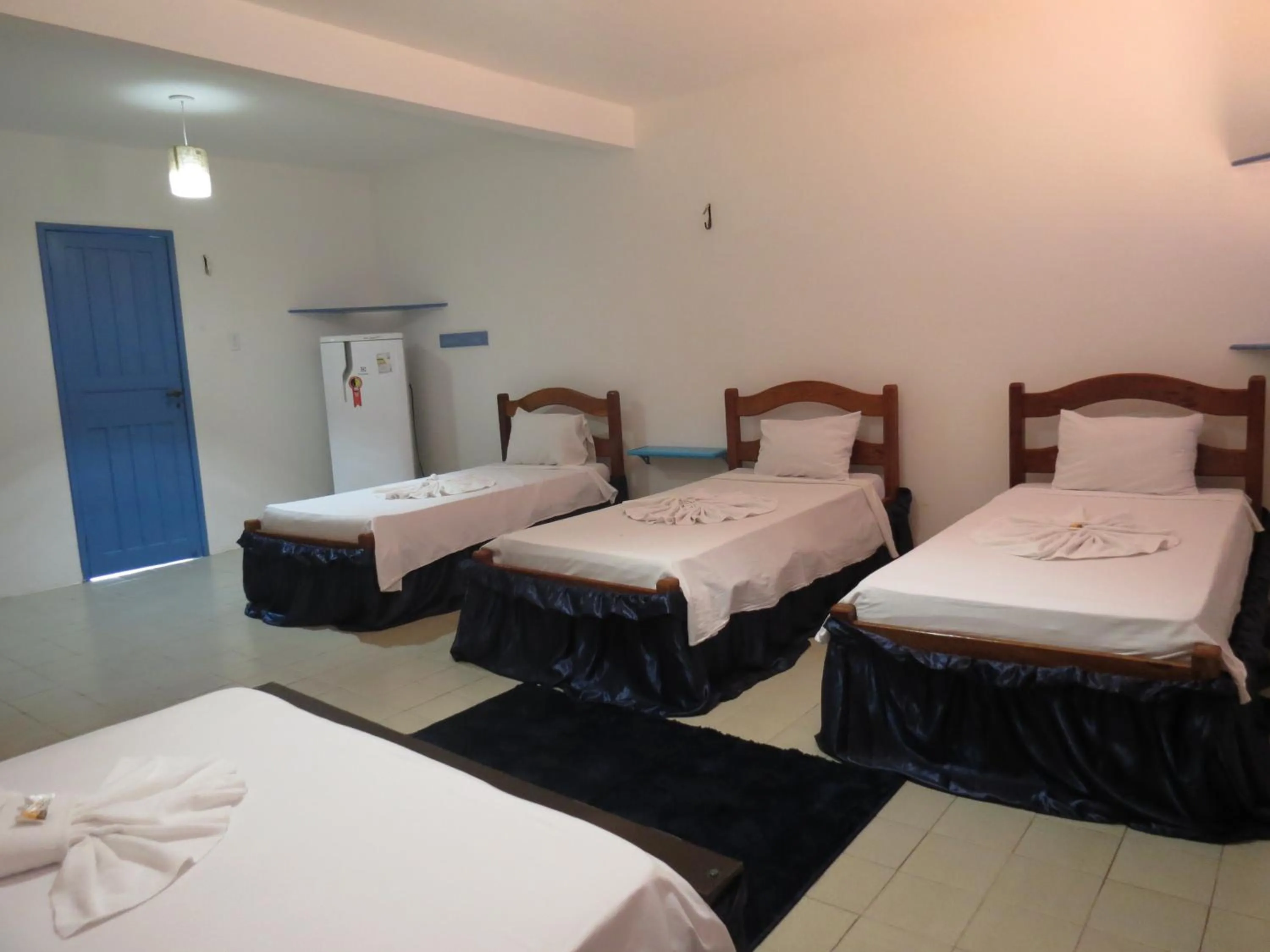 Photo of the whole room, Bed in La Suite Praia Hotel