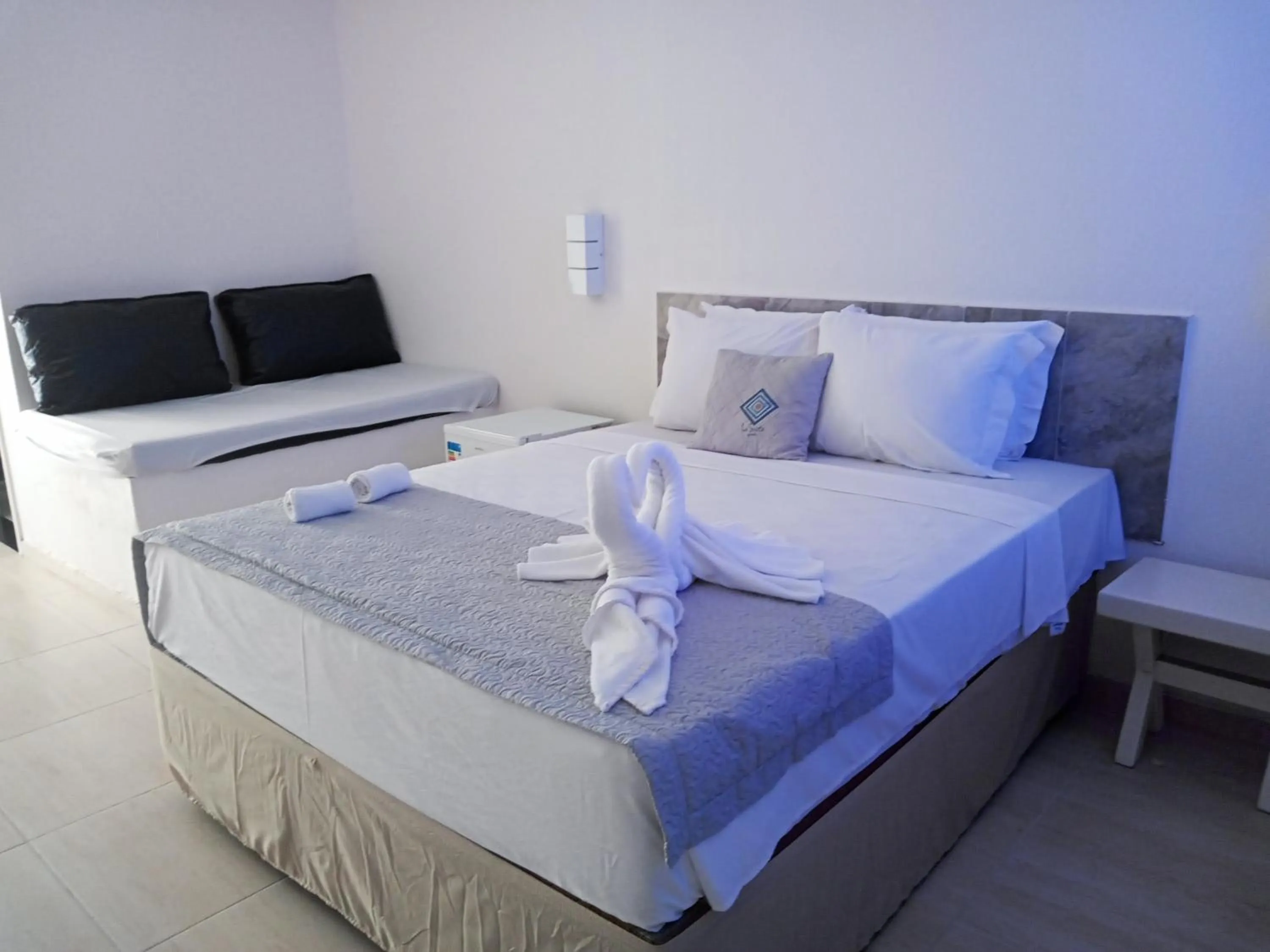 Bedroom, Bed in La Suite Praia Hotel