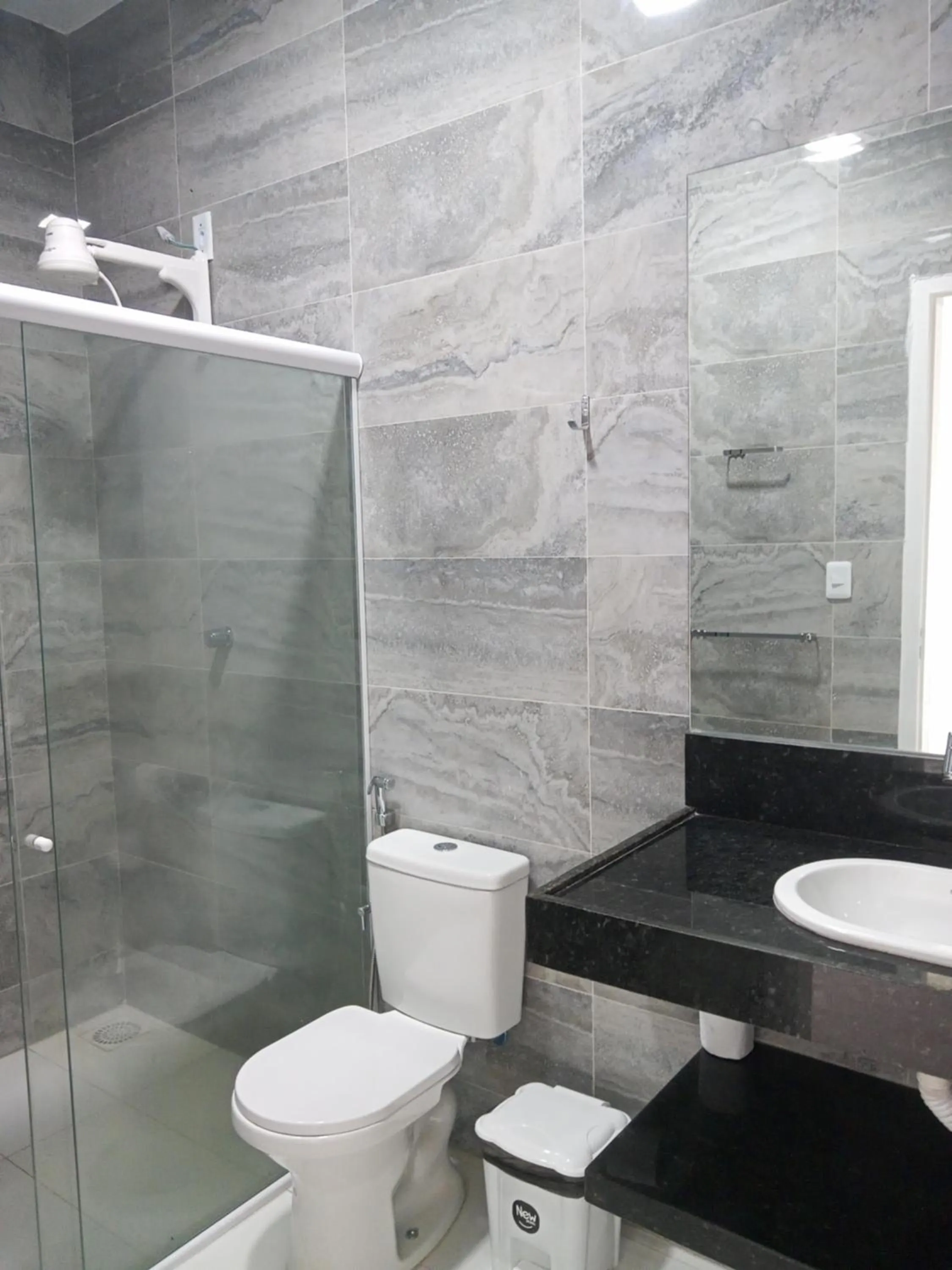 Bathroom in La Suite Praia Hotel