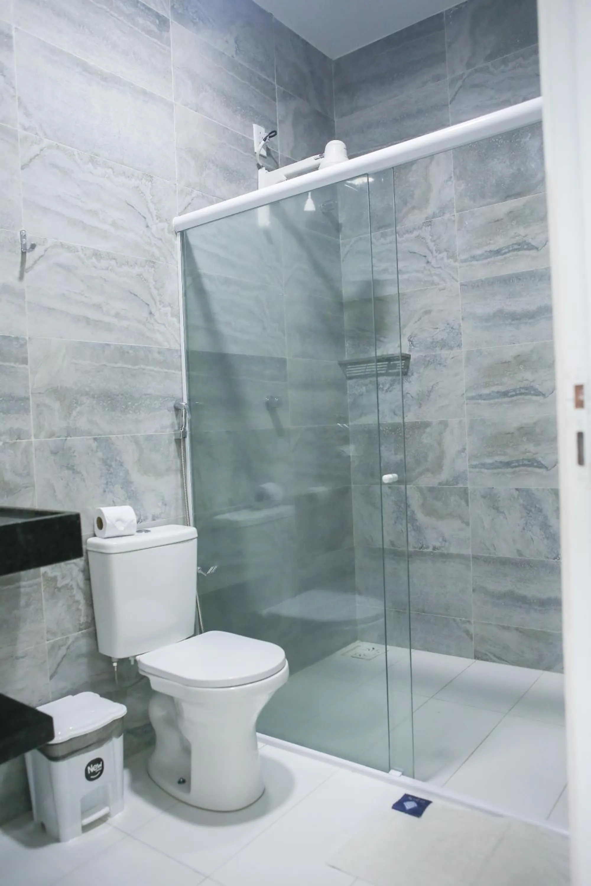 Bathroom in La Suite Praia Hotel