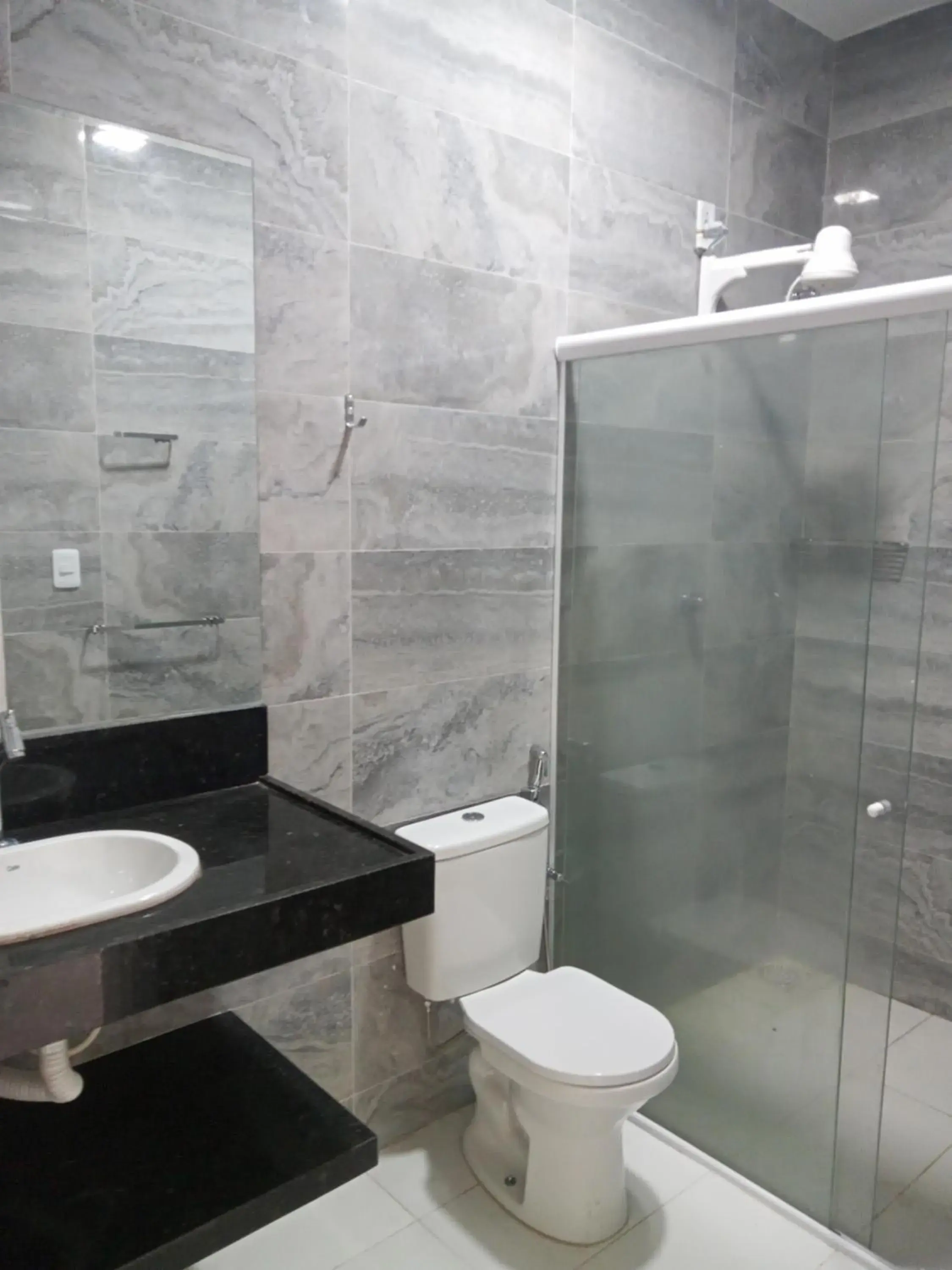 Bathroom in La Suite Praia Hotel Bathroom in La Suite Praia Hotel