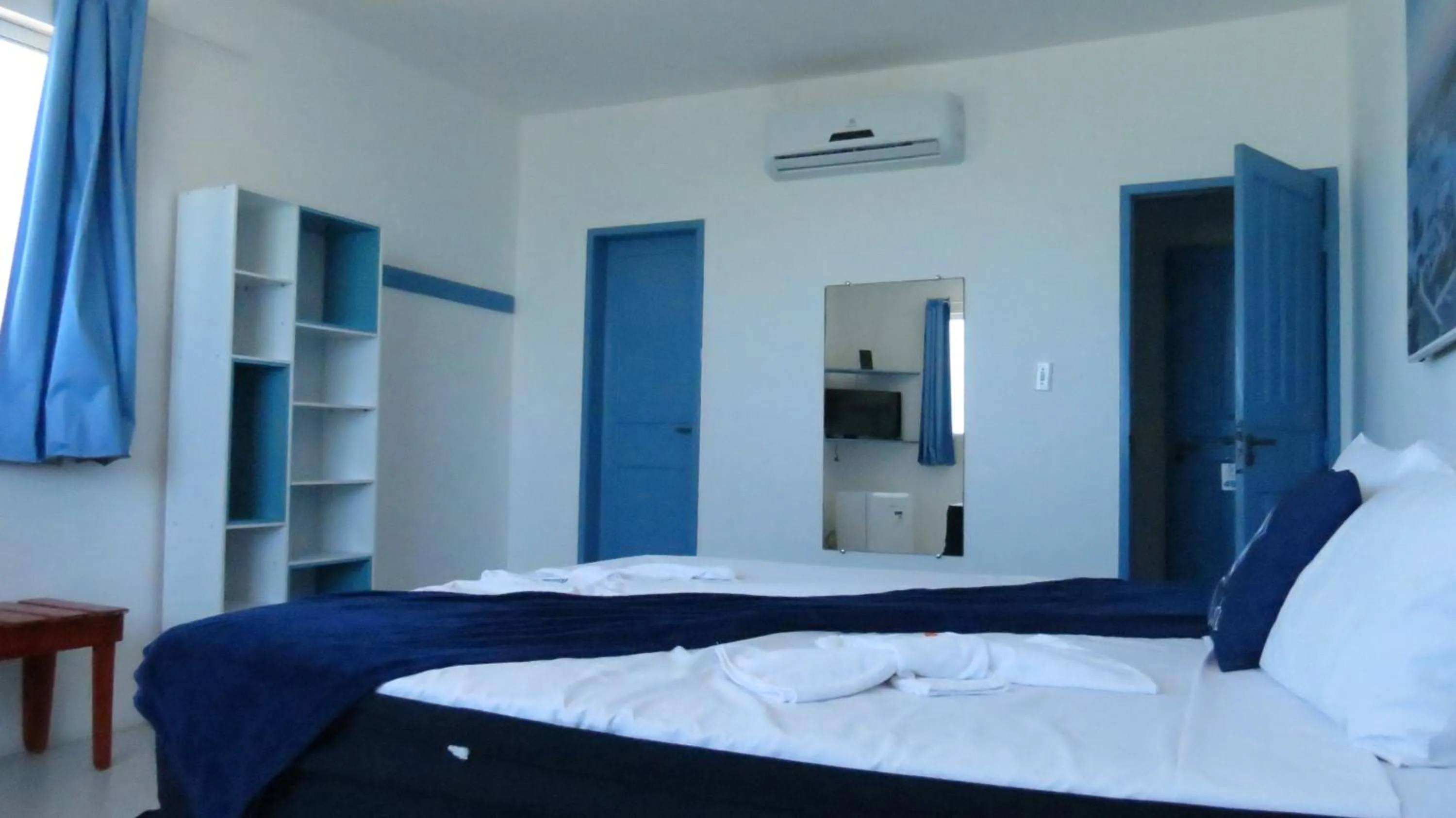 Photo of the whole room, Bed in La Suite Praia Hotel