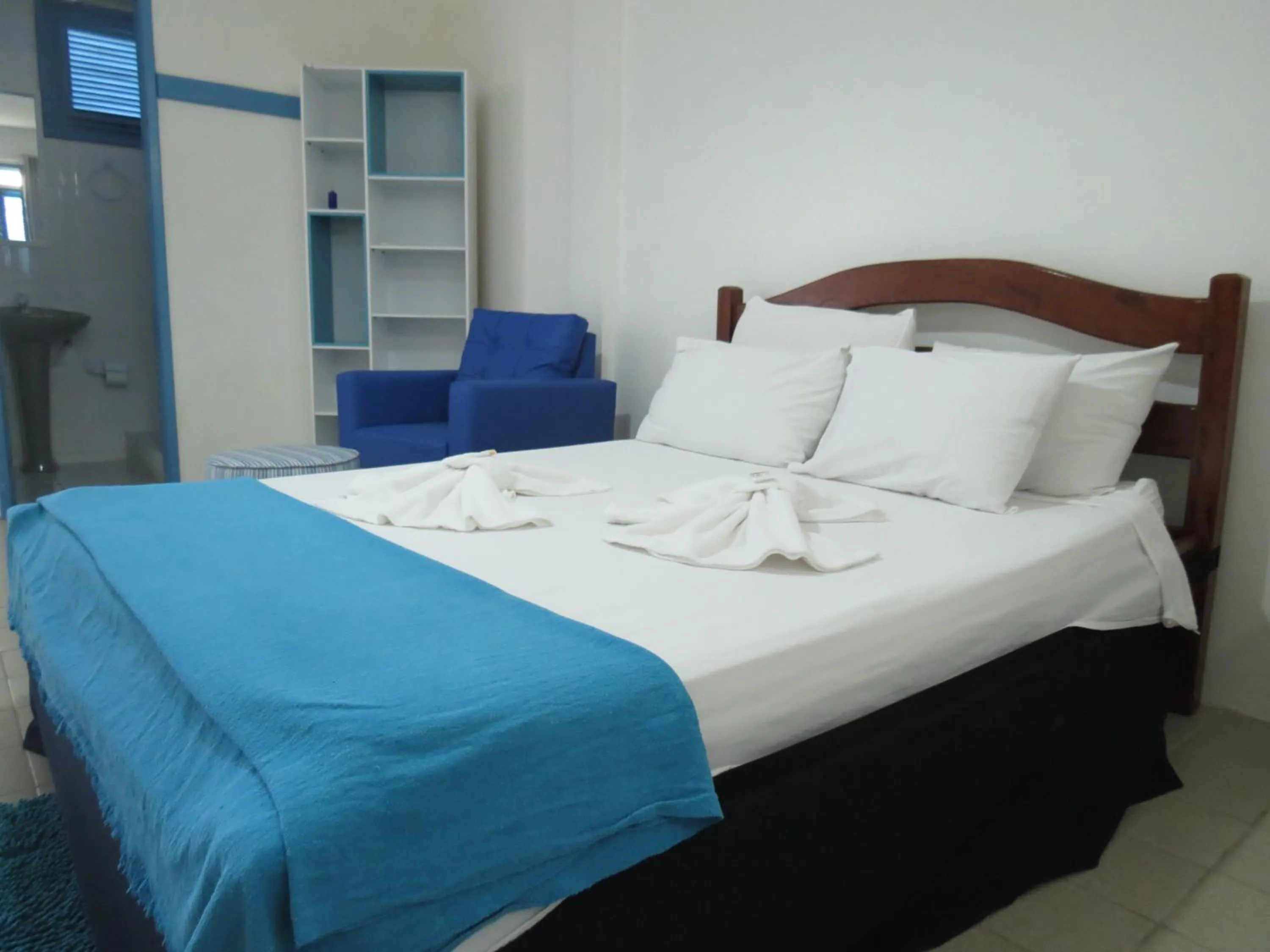 Photo of the whole room, Bed in La Suite Praia Hotel