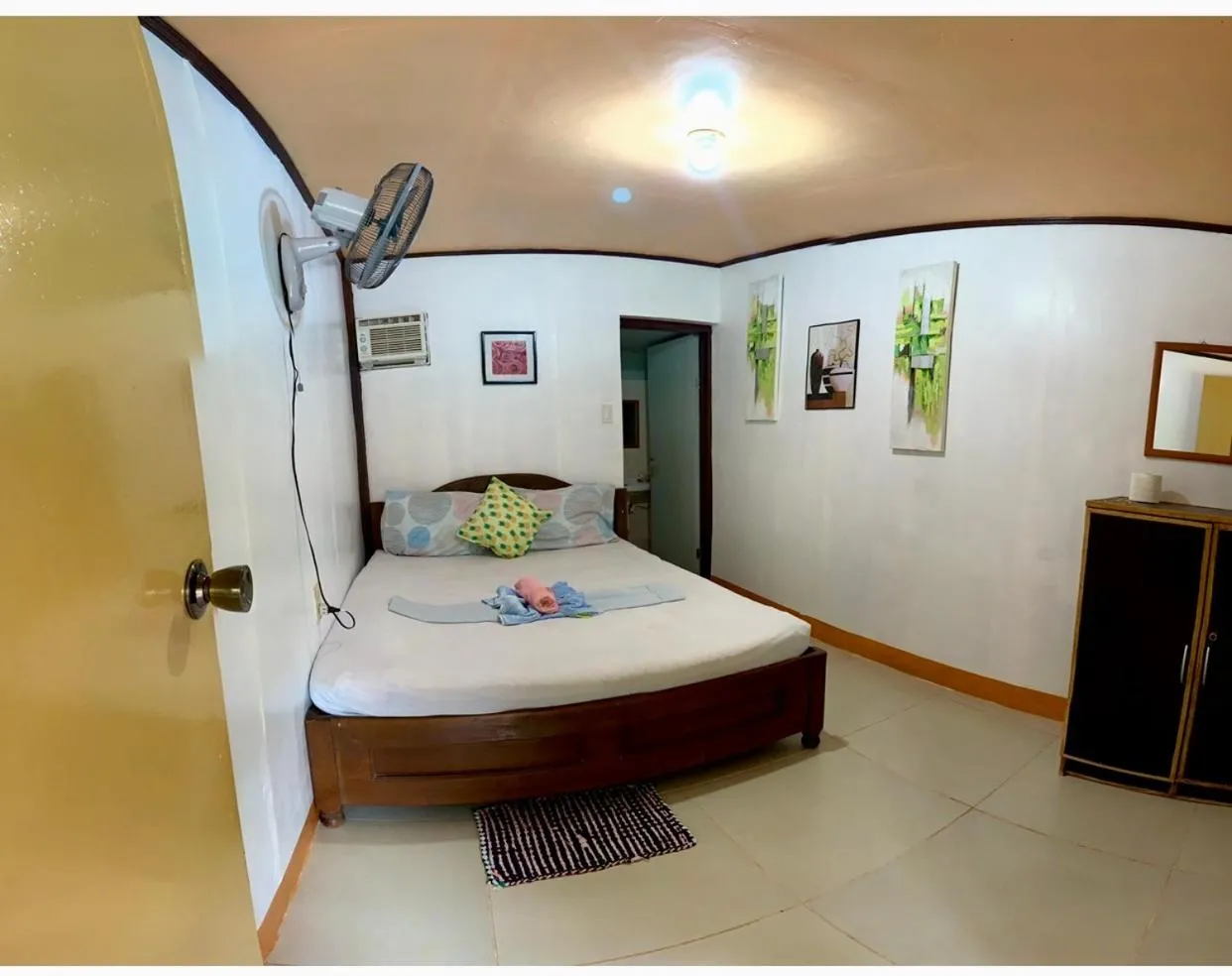 Bed in Domos Native Guest House