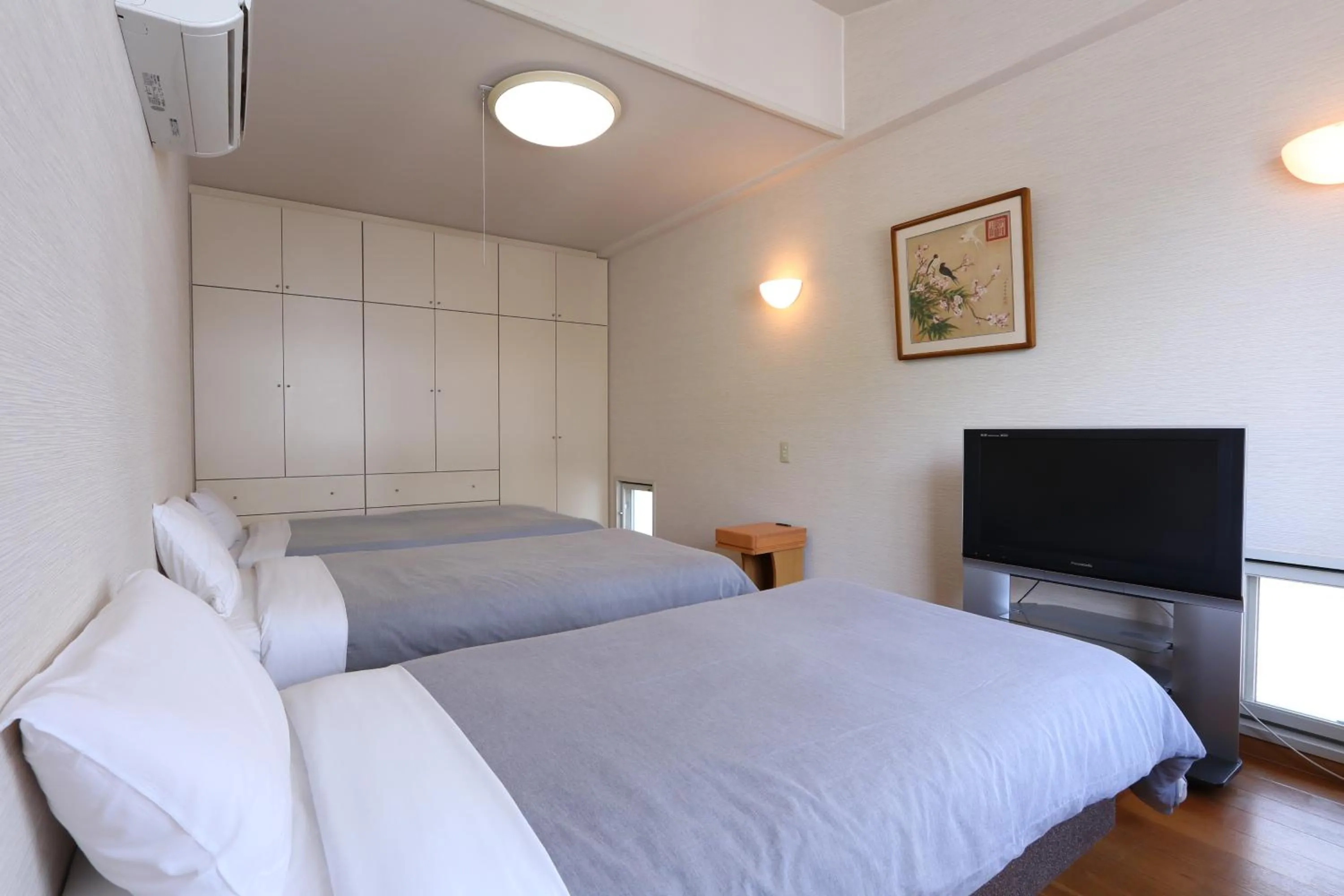 Bed in Shinnishiki Hotel