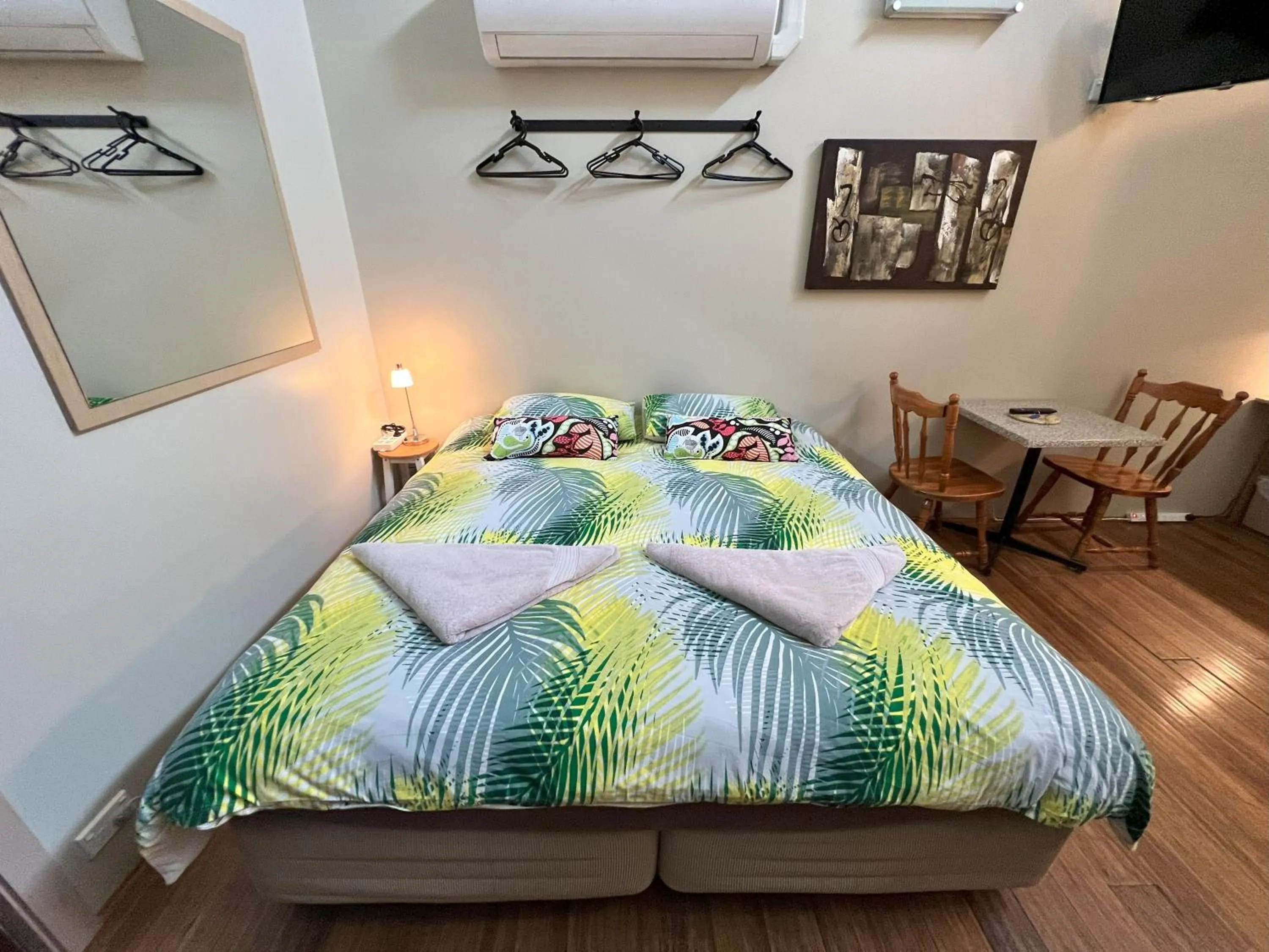 Bed in Westside Studio Apartments