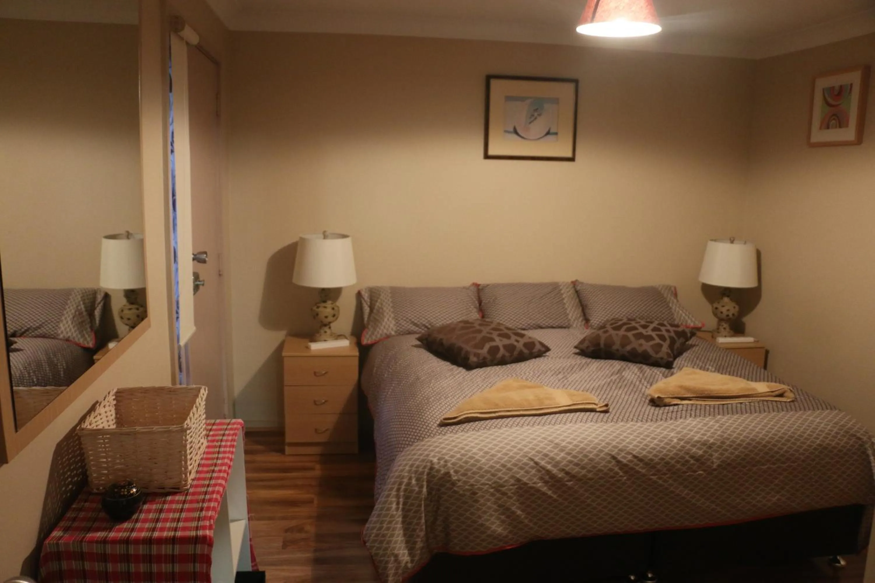 Bed in Westside Studio Apartments