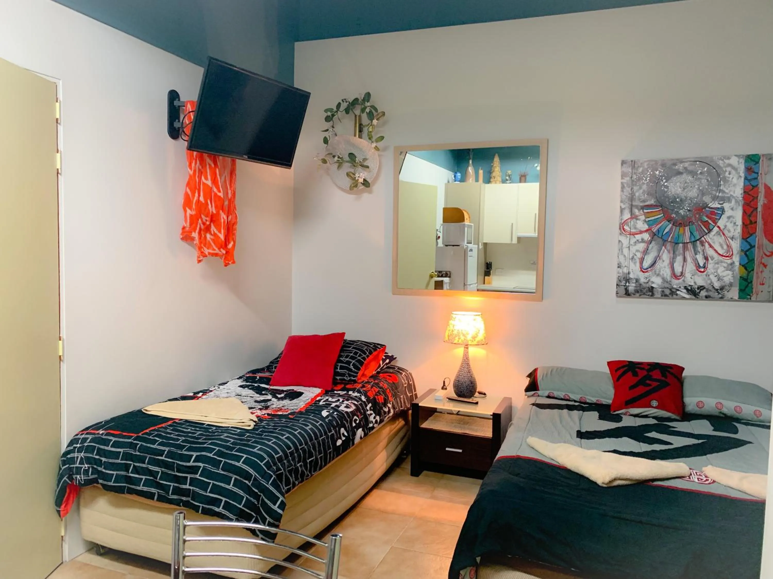 Bed in Westside Studio Apartments