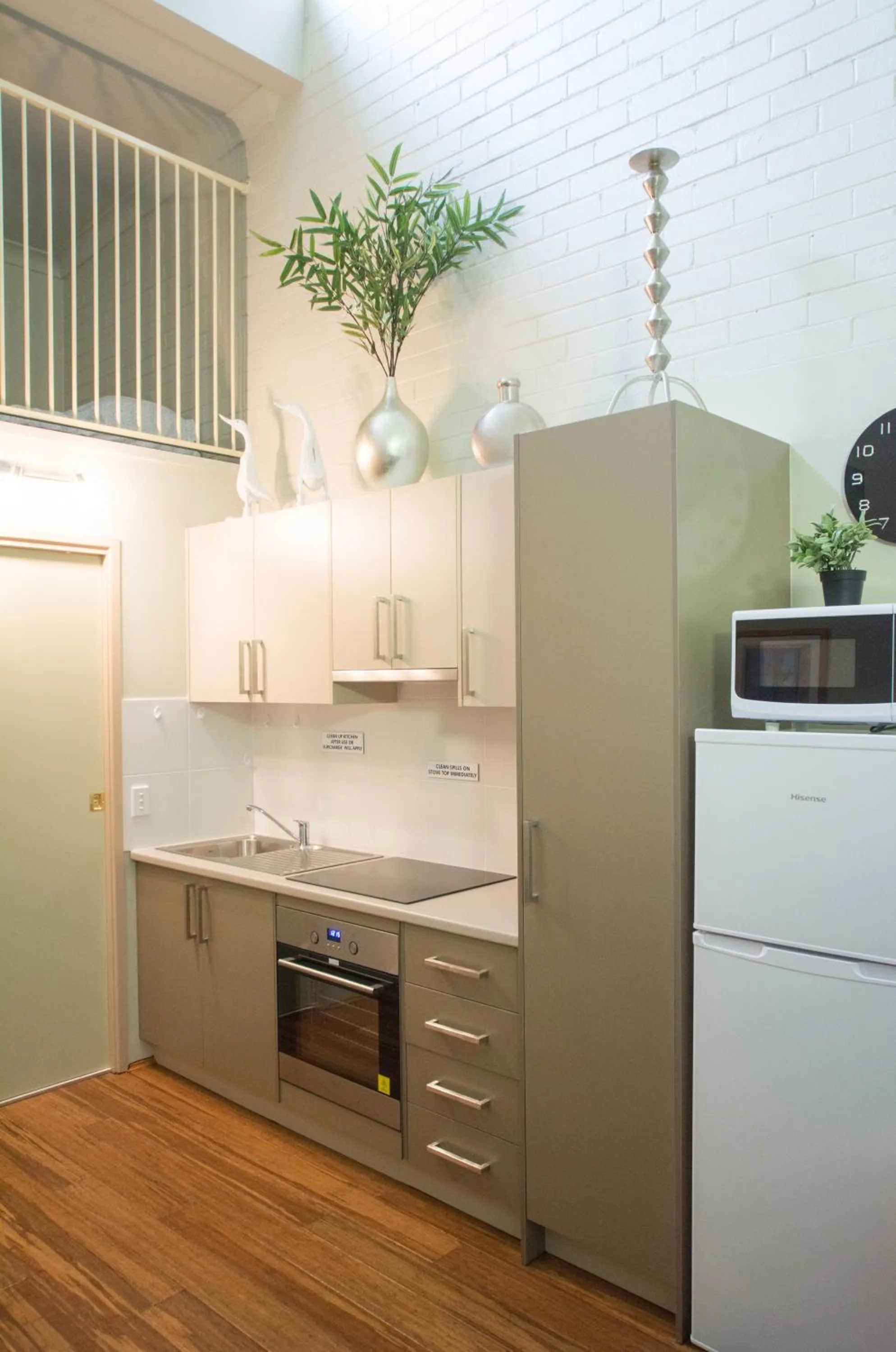 Kitchen or kitchenette in Westside Studio Apartments