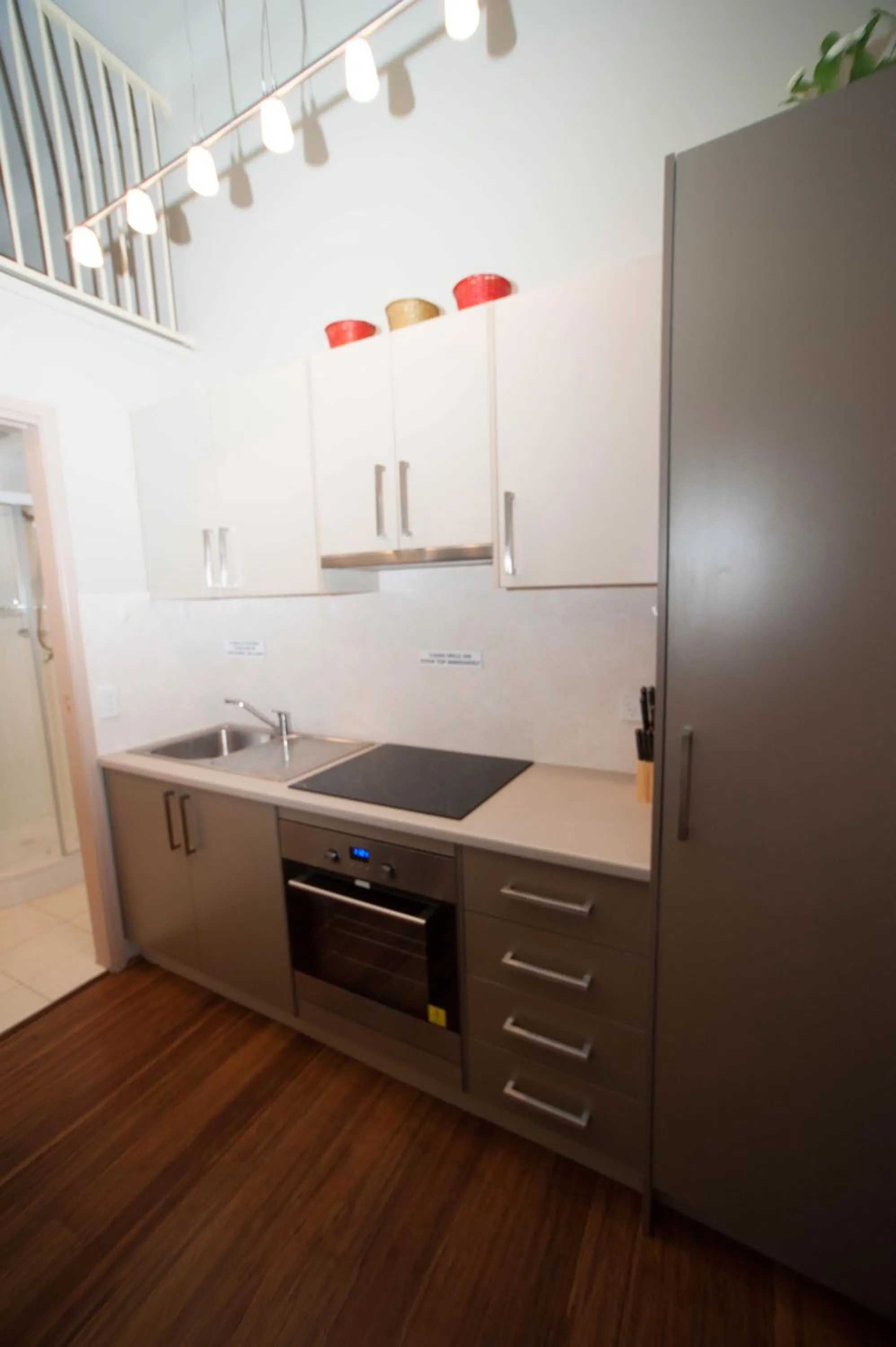Kitchen or kitchenette in Westside Studio Apartments