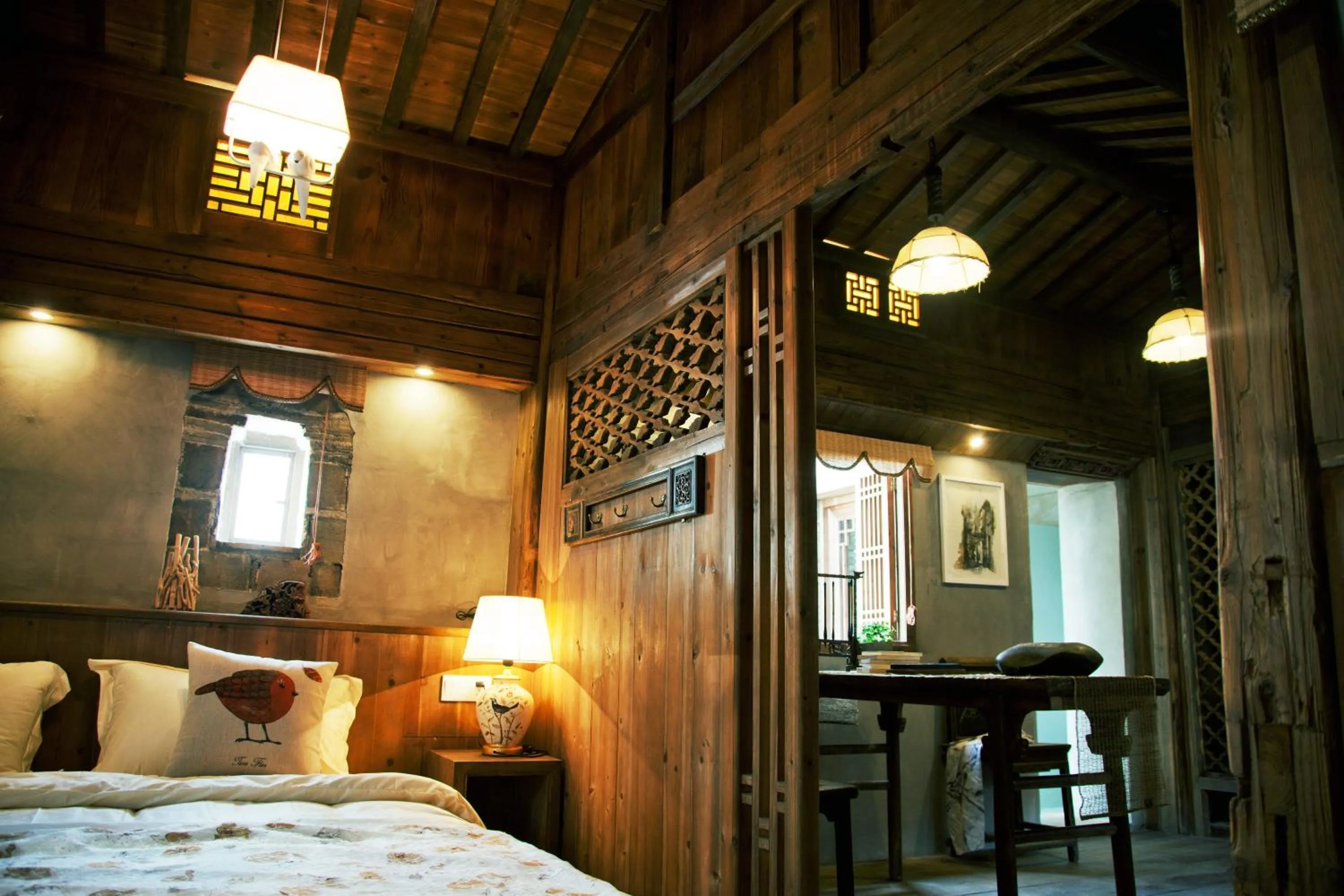 Photo of the whole room, Bed in WuYuan QiYe YanXiang Guesthouse