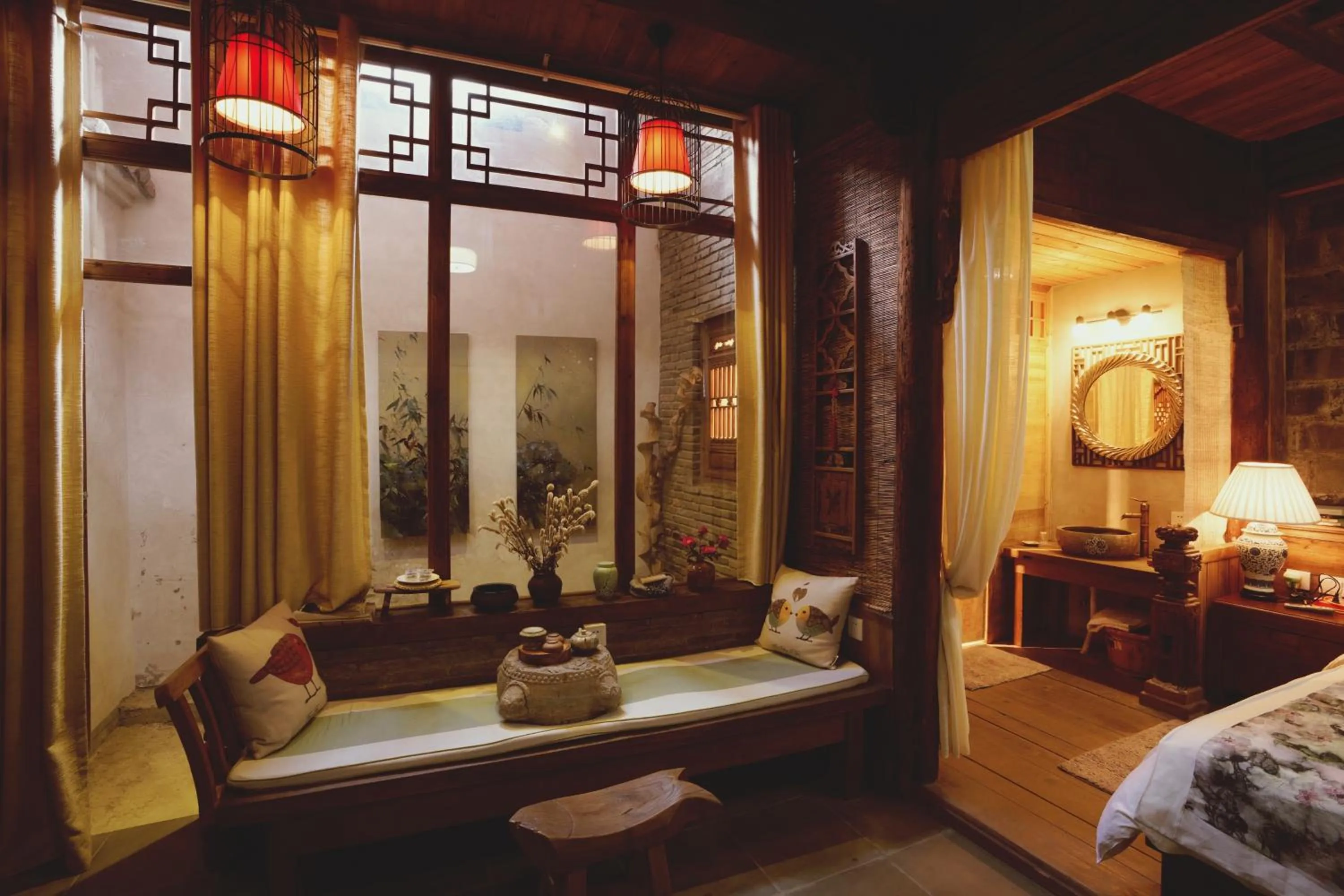 Bed in WuYuan QiYe YanXiang Guesthouse