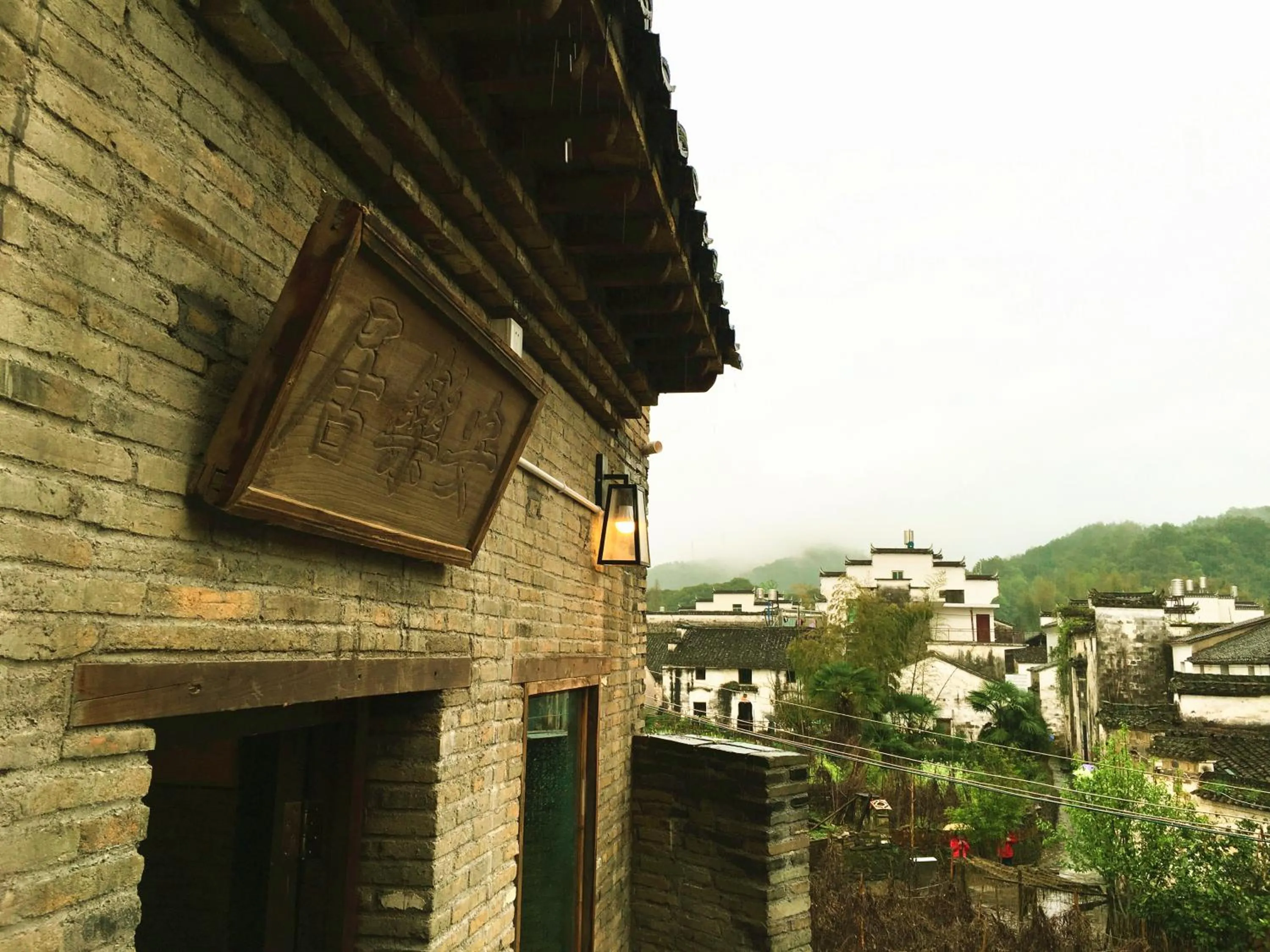 Property building in WuYuan QiYe YanXiang Guesthouse