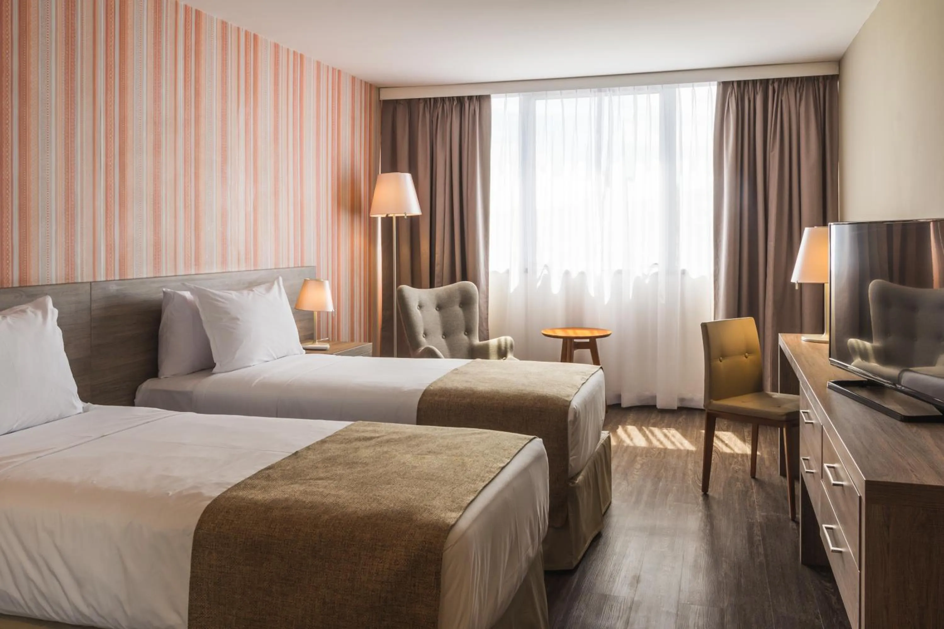 Bed in Frontier Hotel Rivera