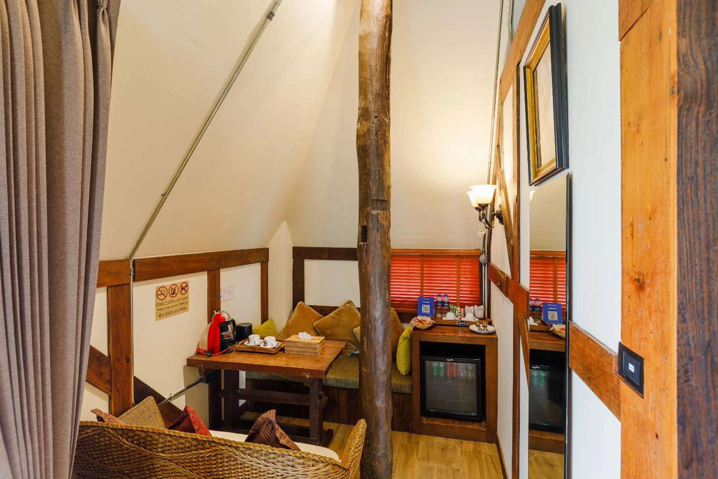 Living room in Le Charcoa Hotel