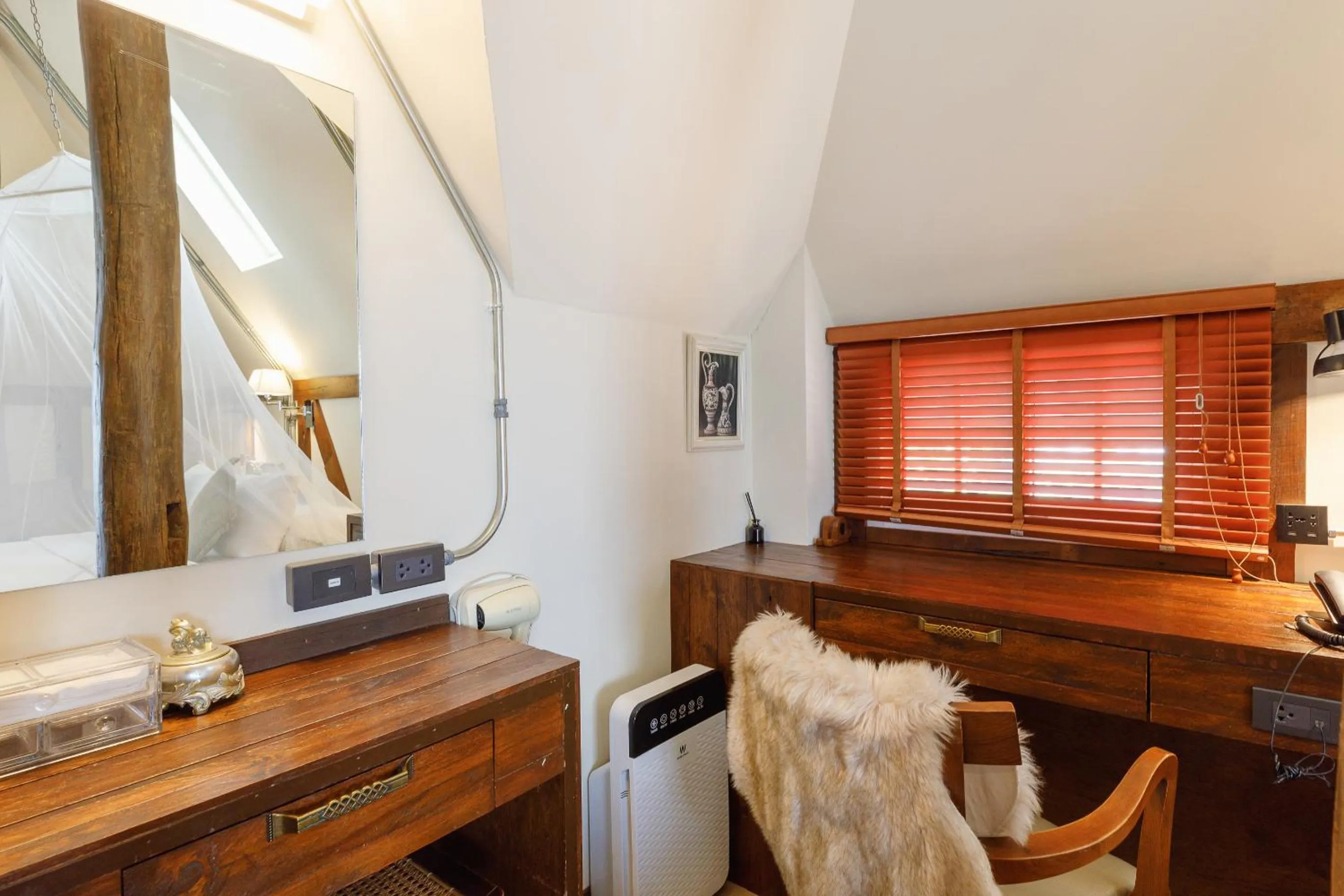 Seating area in Le Charcoa Hotel