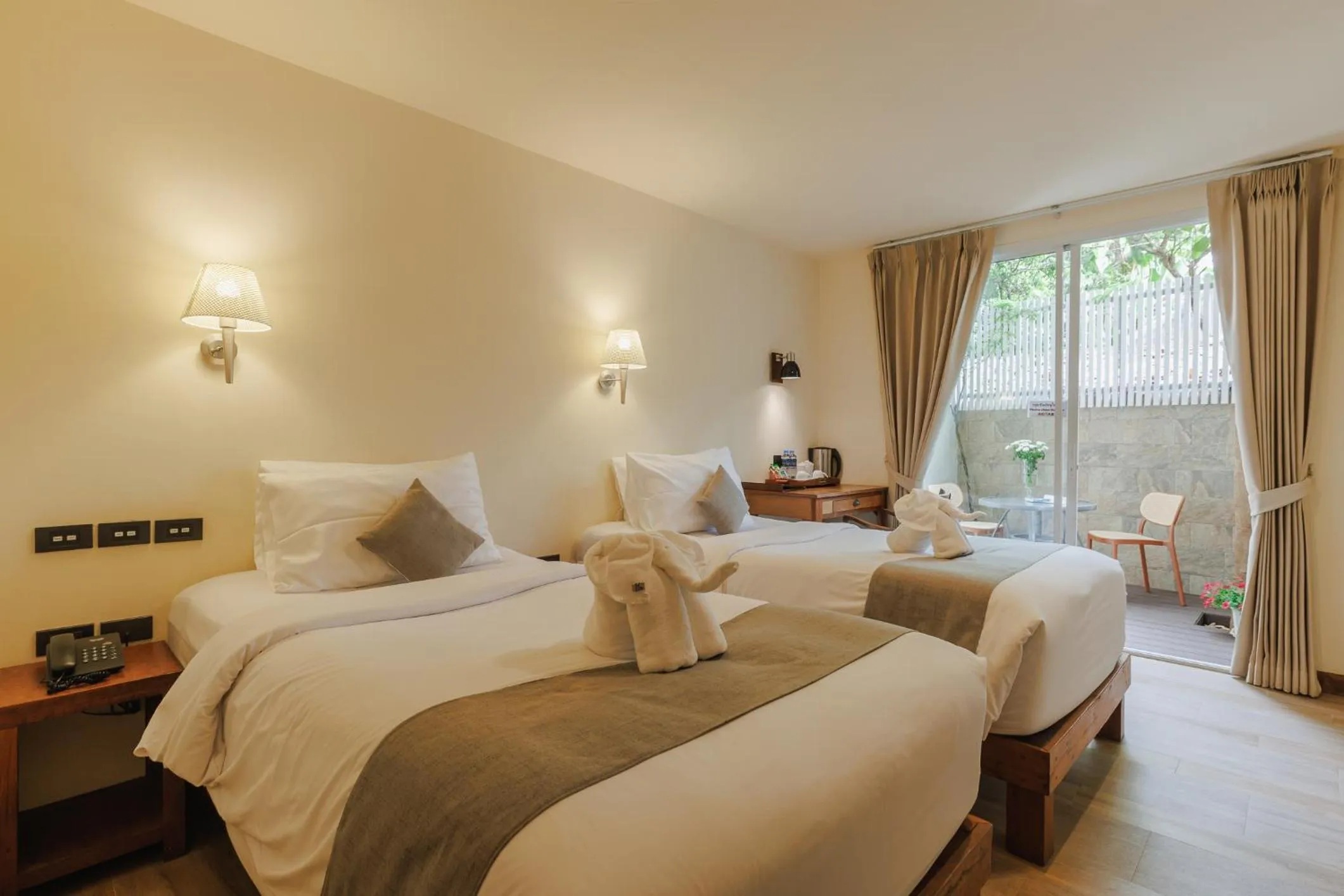 Bed in Le Charcoa Hotel