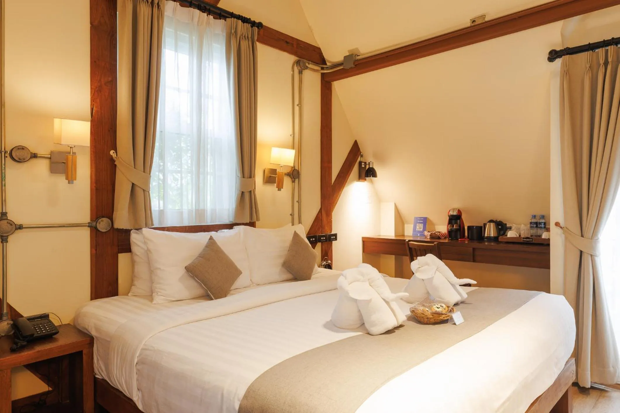 Bed in Le Charcoa Hotel