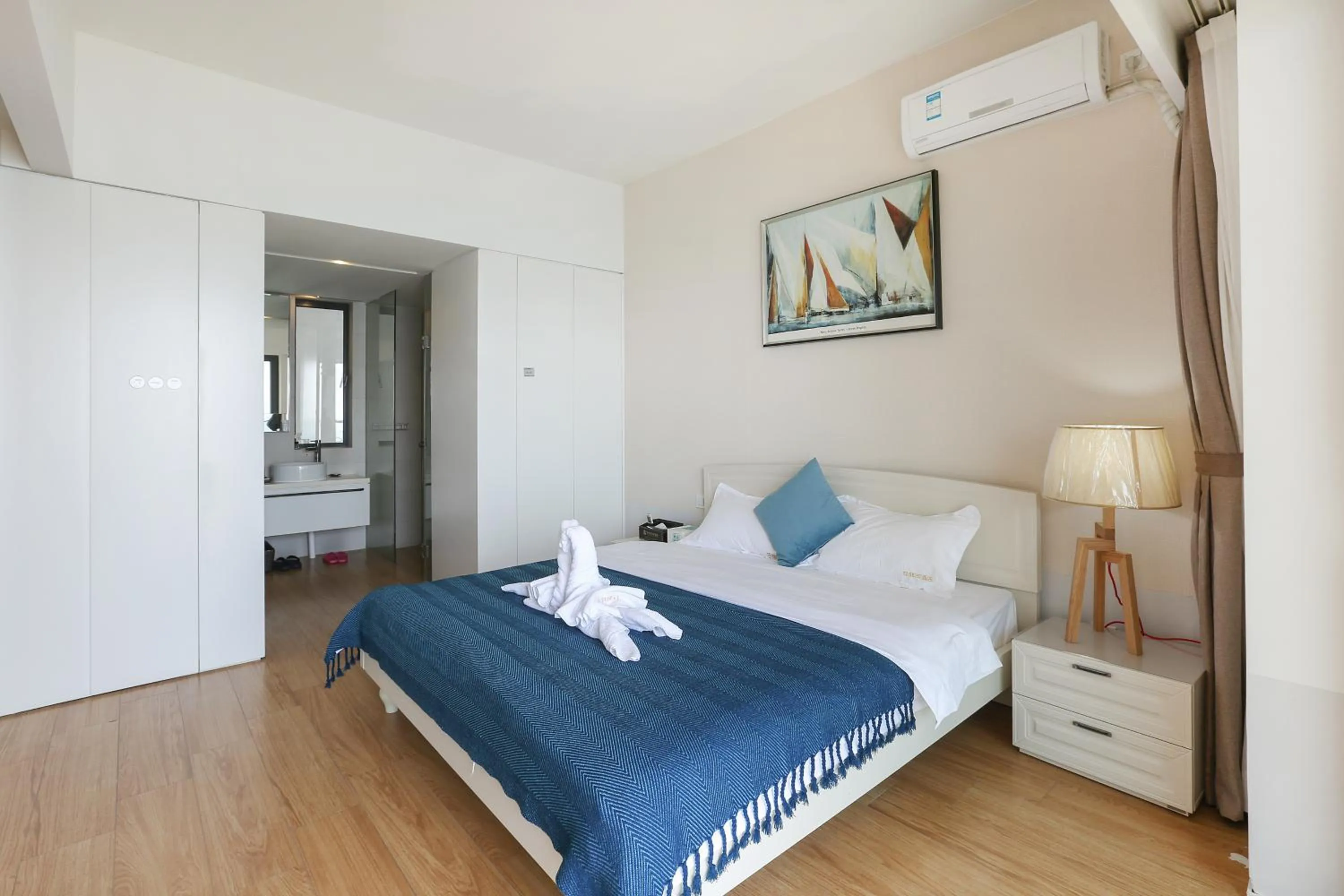 Bed in HuiZhou HuaYangNian Seaview Guesthouse