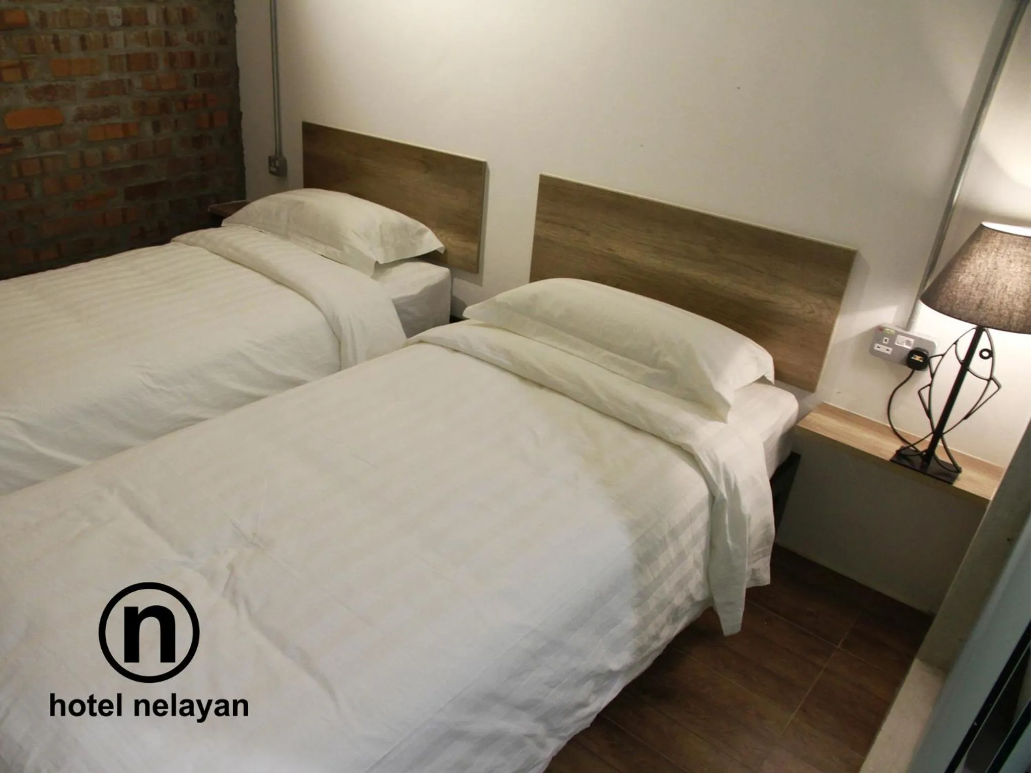 View (from property/room), Bed in Hotel Nelayan