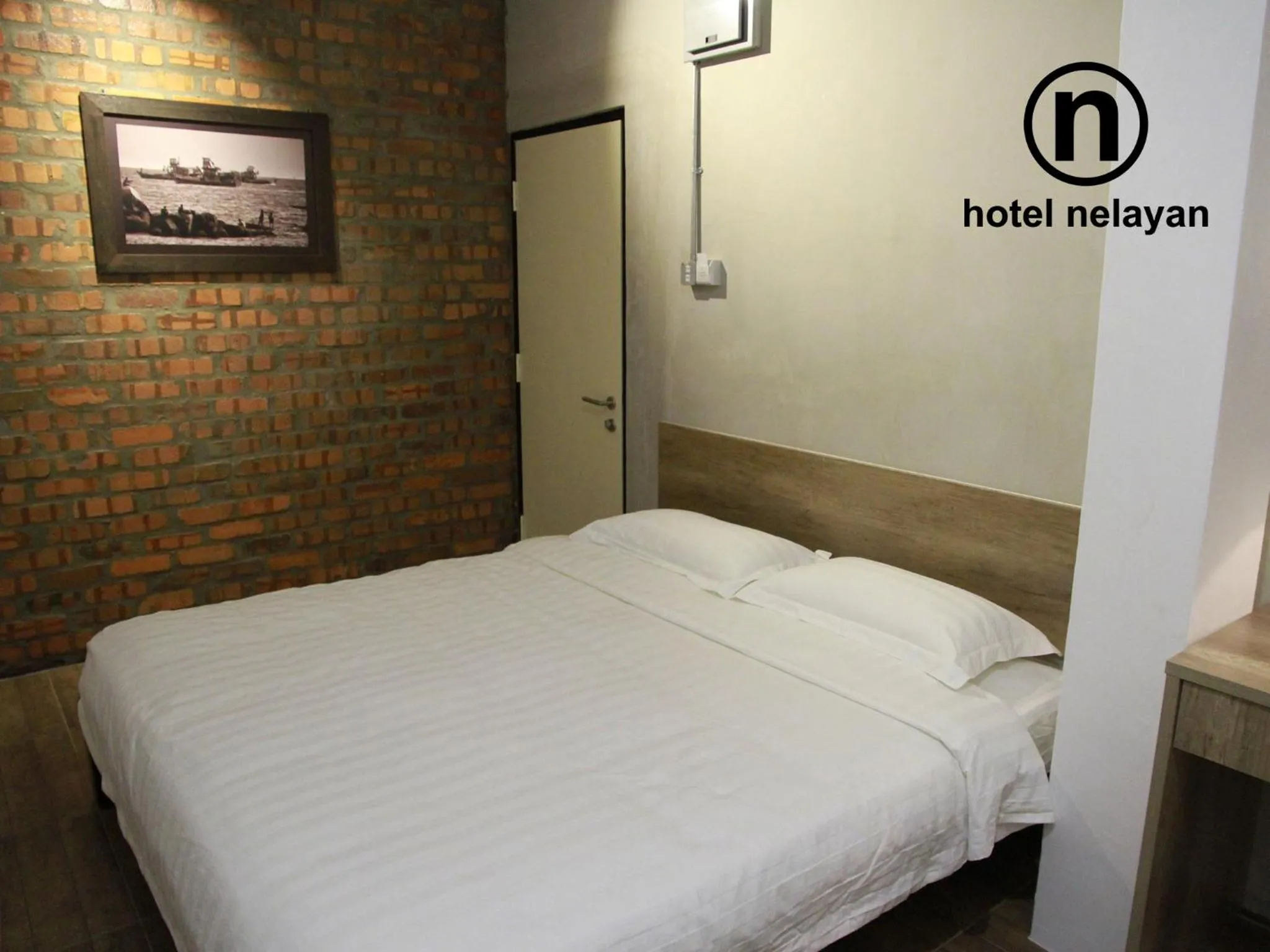 View (from property/room), Bed in Hotel Nelayan