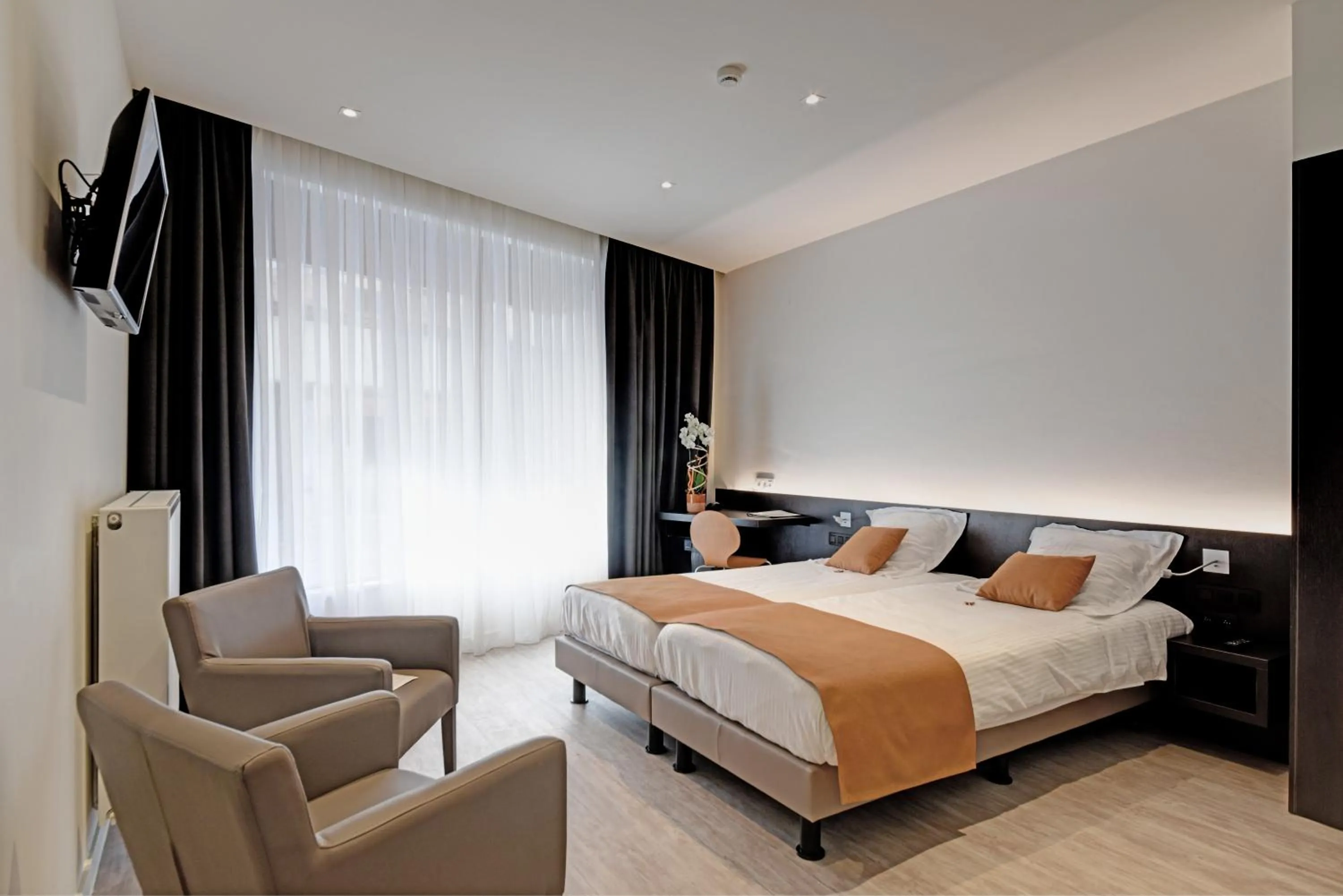 Bed in Hotel Du Commerce