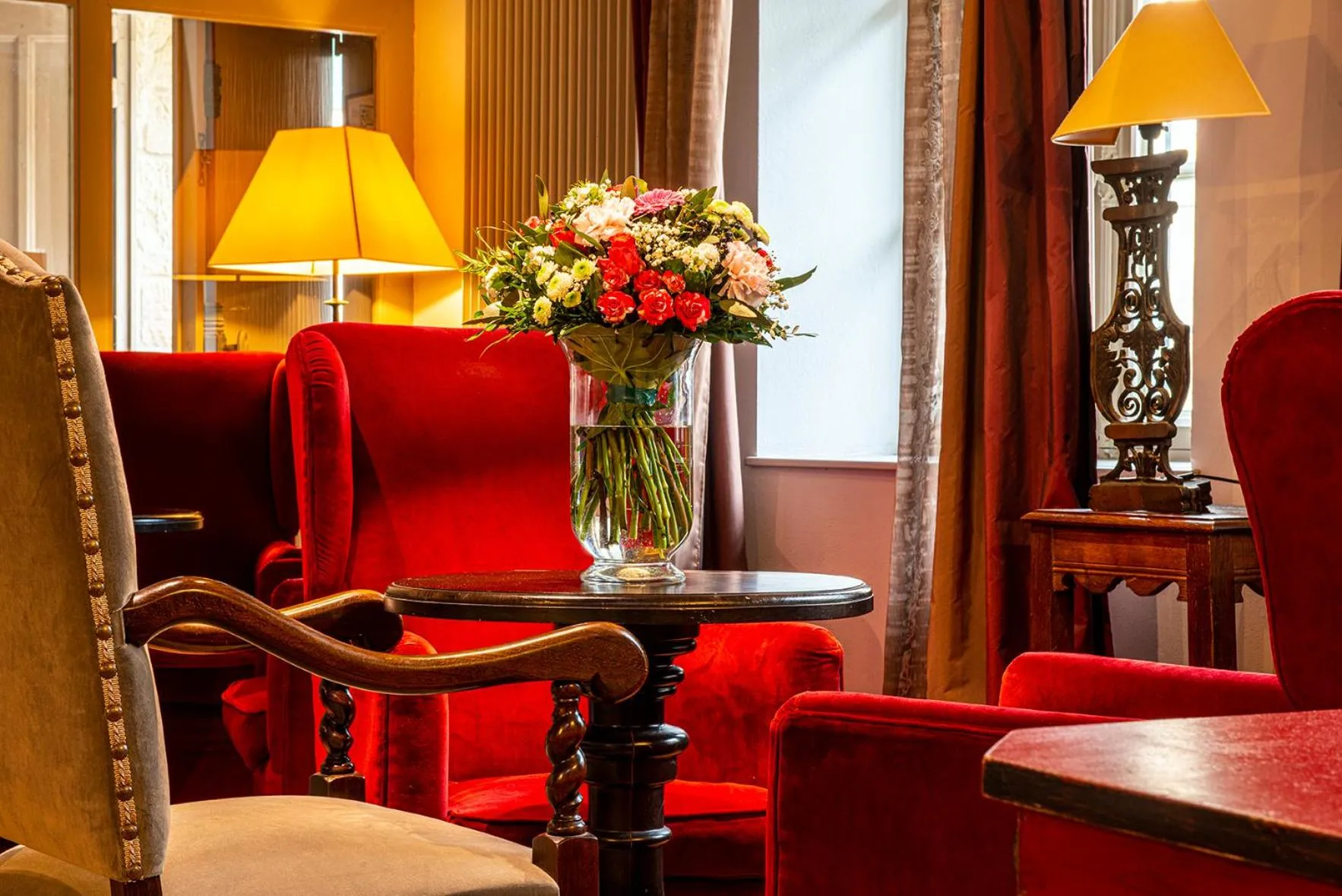 Seating area in Hôtel Le Donjon - Cœur de La Cité Médiévale