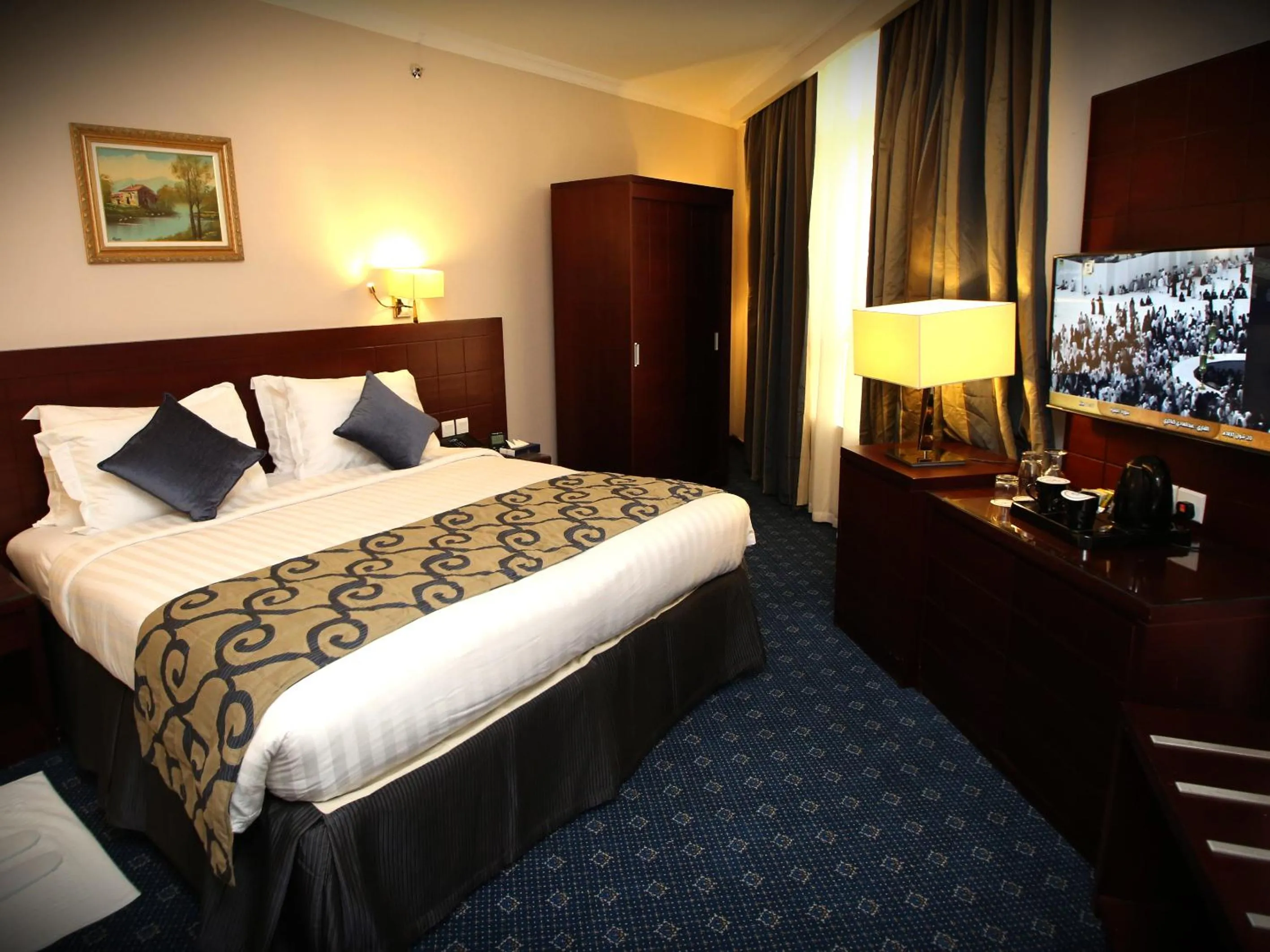Bed in Al Aqeeq Al Rawda Hotel by Abu Al Joud