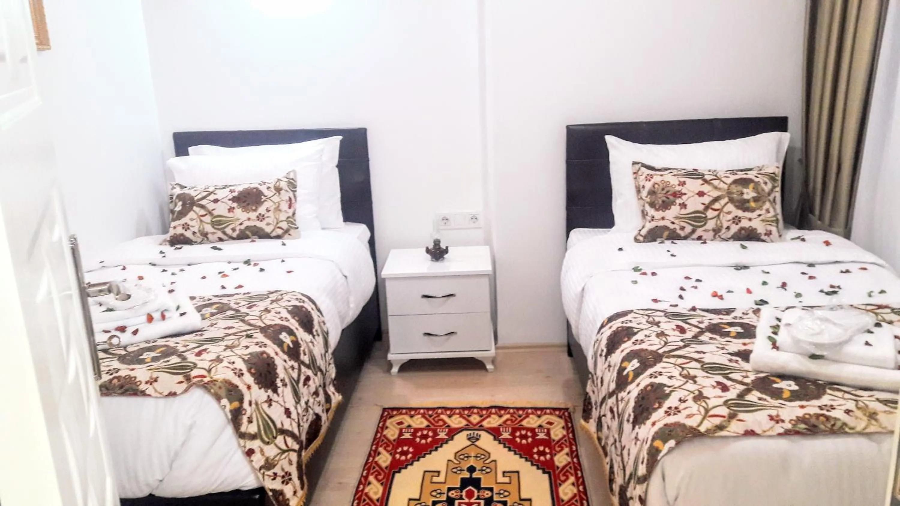 Bed in Golden Life Apart Hotel