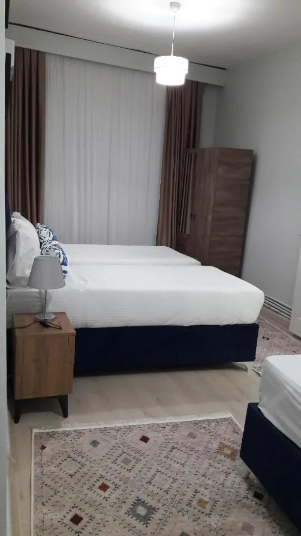 Bed in Golden Life Apart Hotel