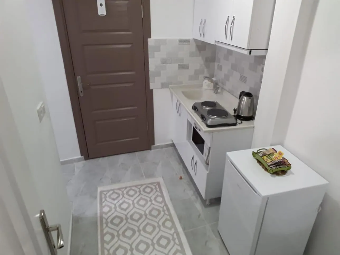 Kitchen or kitchenette in Golden Life Apart Hotel