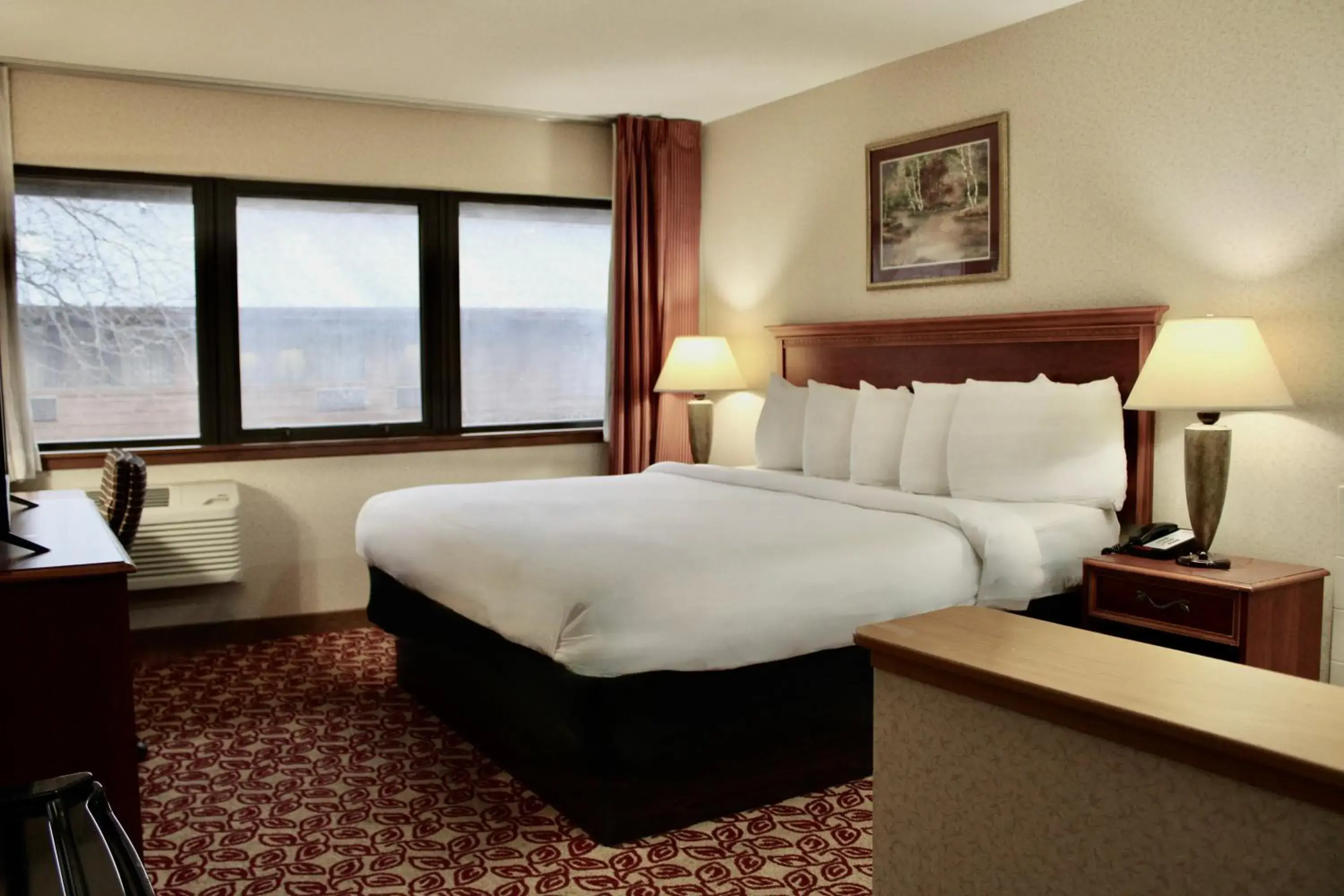 Bed in Carlton Lodge Hotel and Suites Bed in Carlton Lodge Hotel and Suites