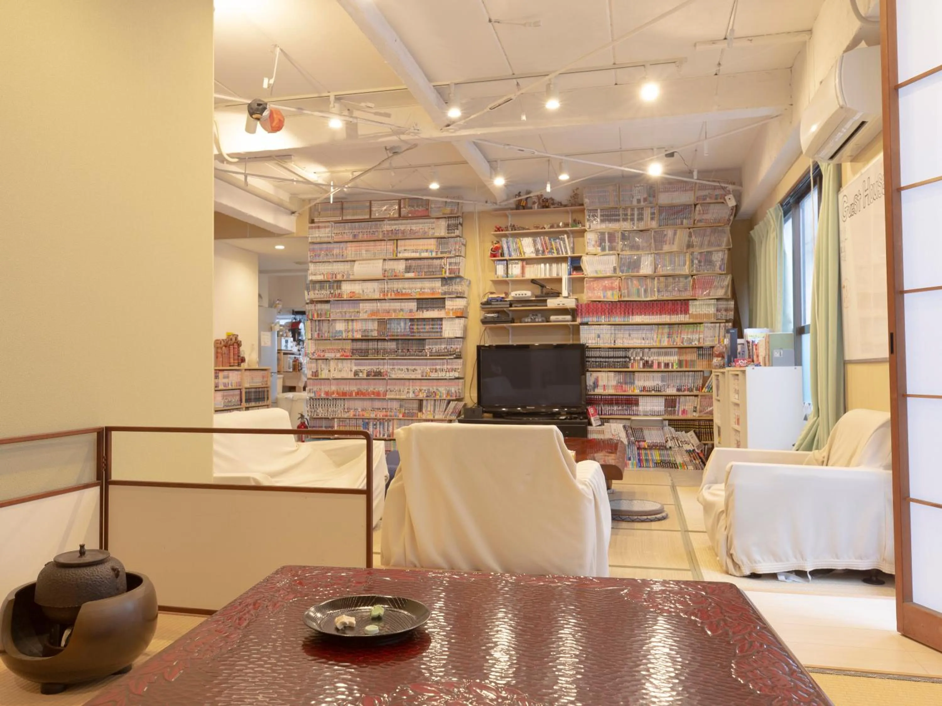 Communal lounge/ TV room in Guesthouse Sensu