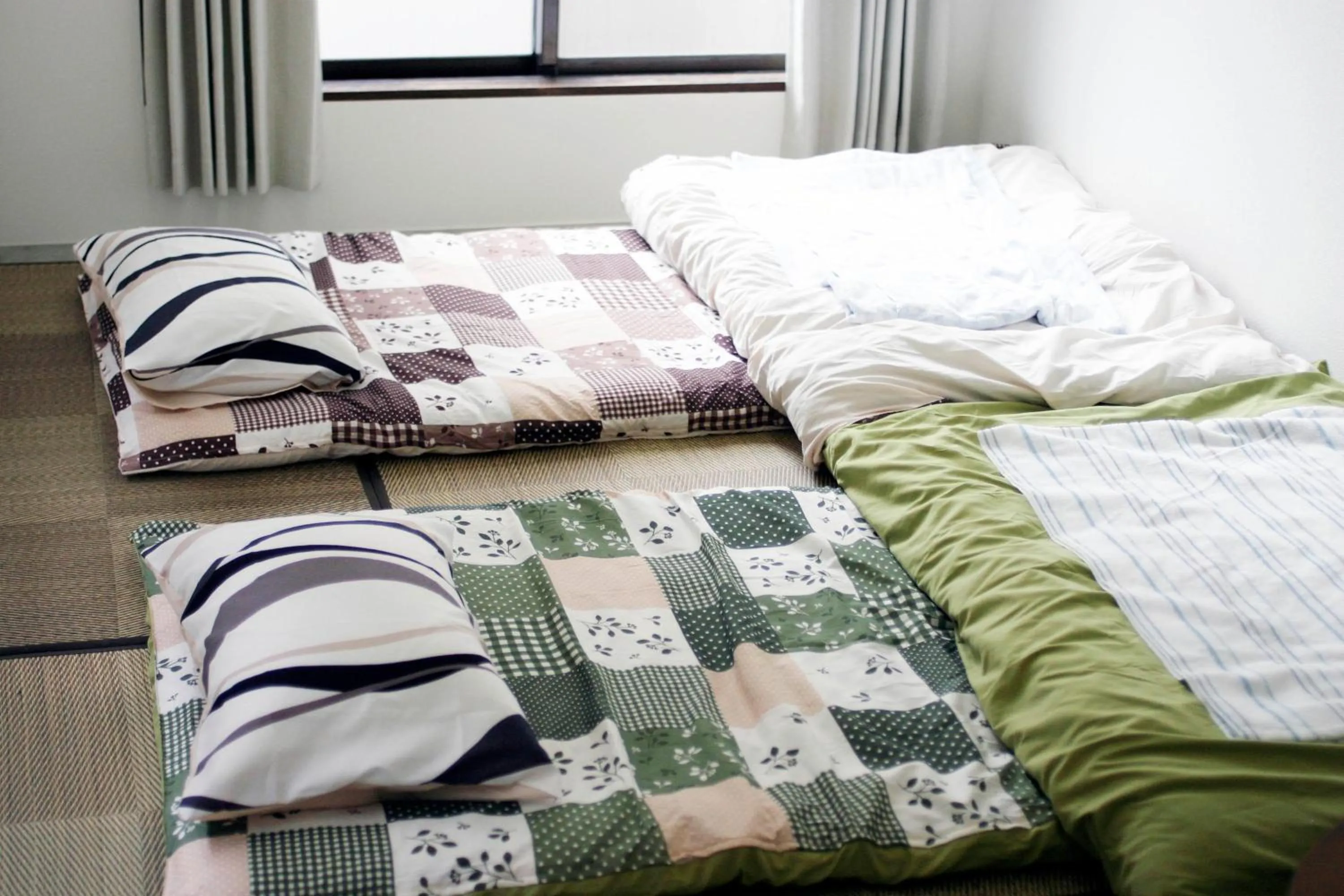 Bed in Guesthouse Sensu