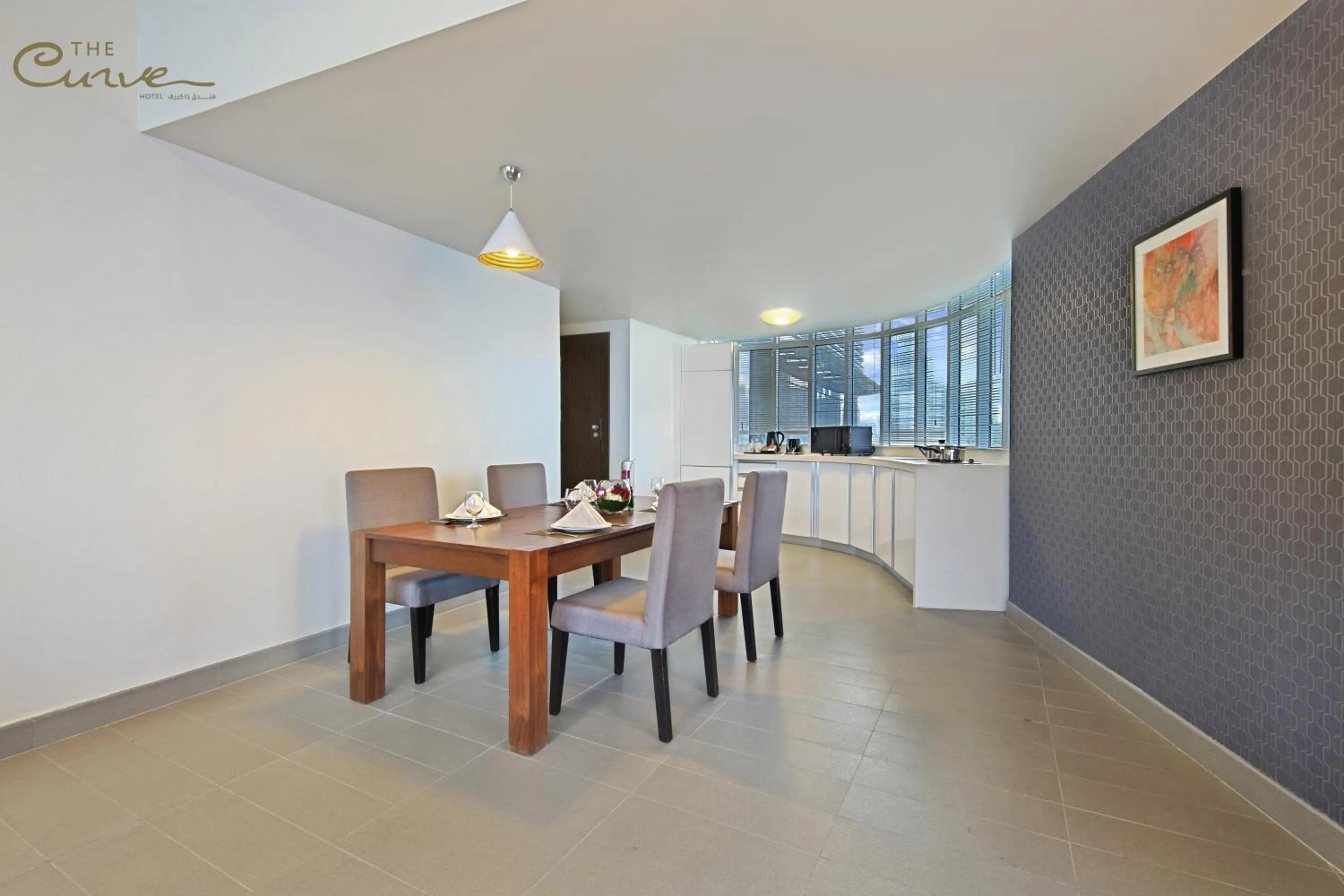 Kitchen or kitchenette in The Curve Hotel