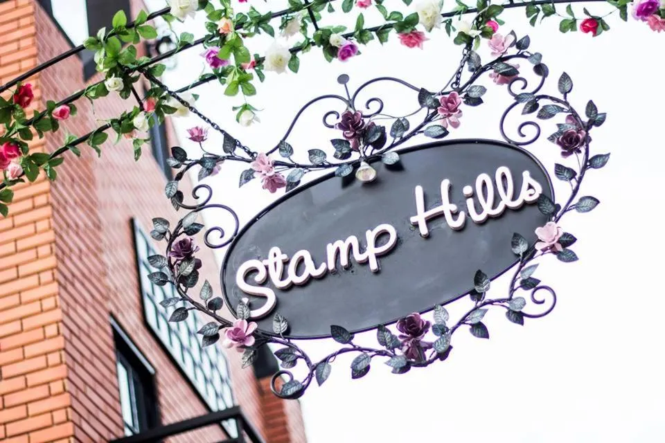 Property logo or sign in Stamp Hills Resort