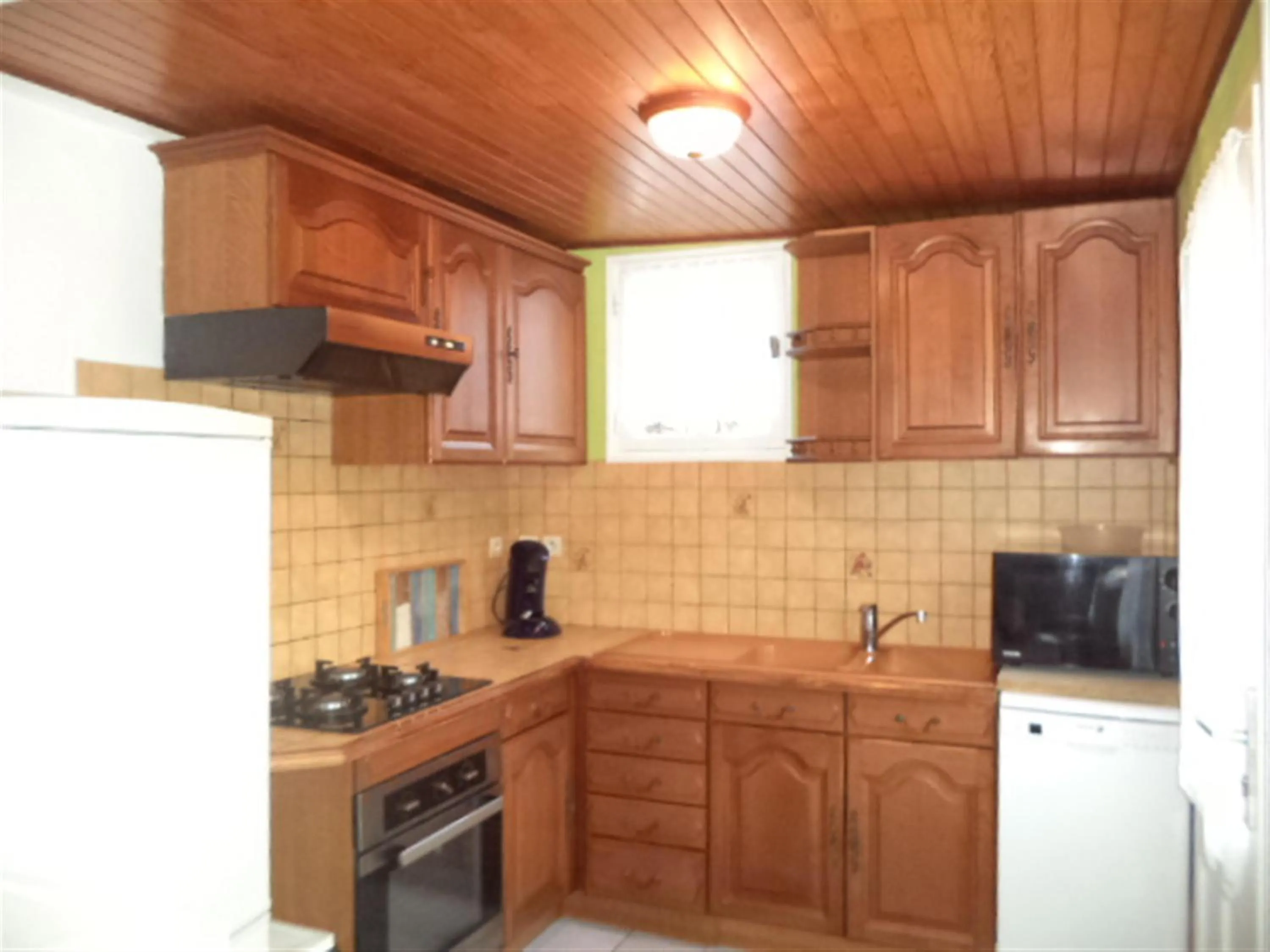 Kitchen or kitchenette in Maison de vacances à Créances