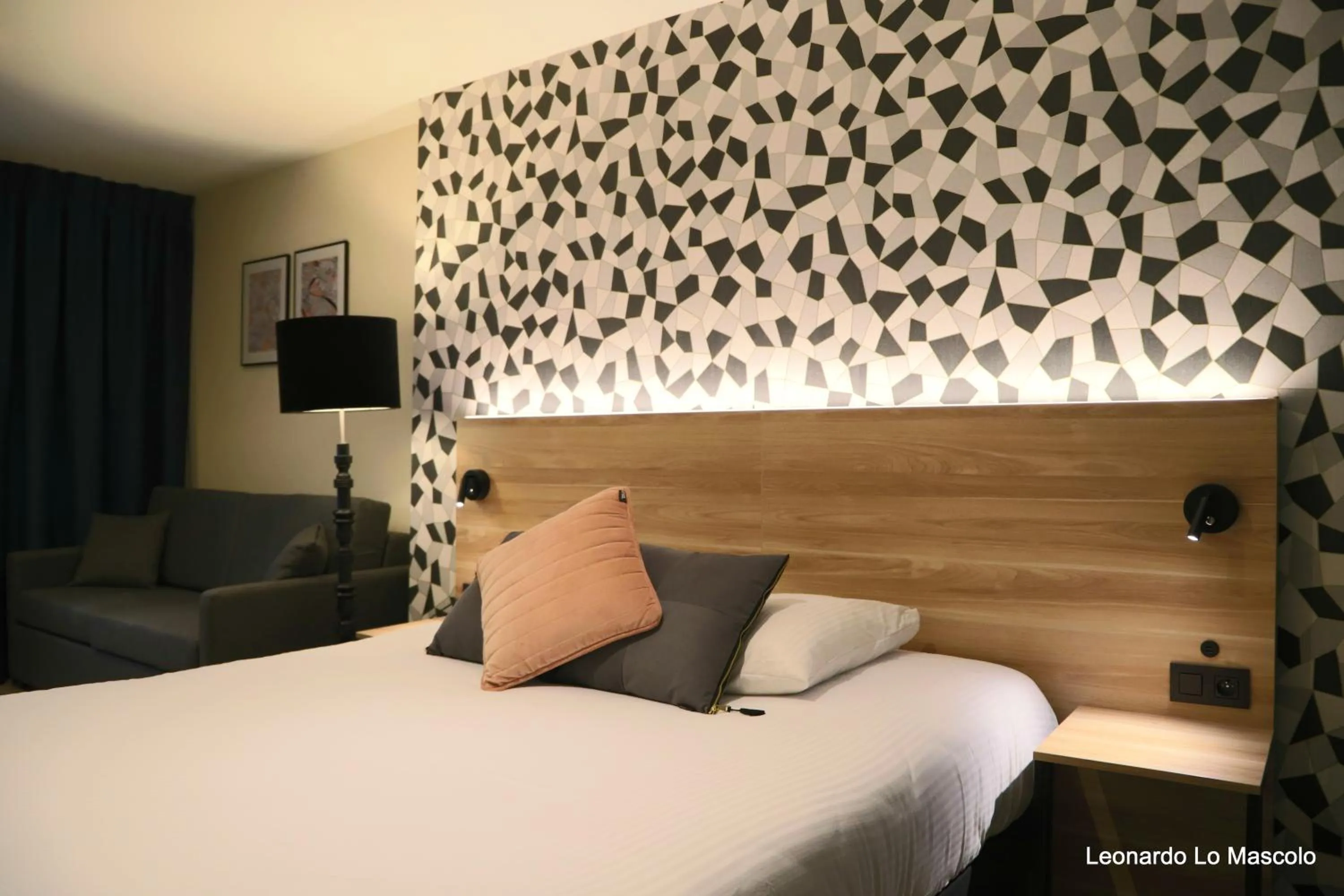 Bed in Hôtel de l'Univers Liège