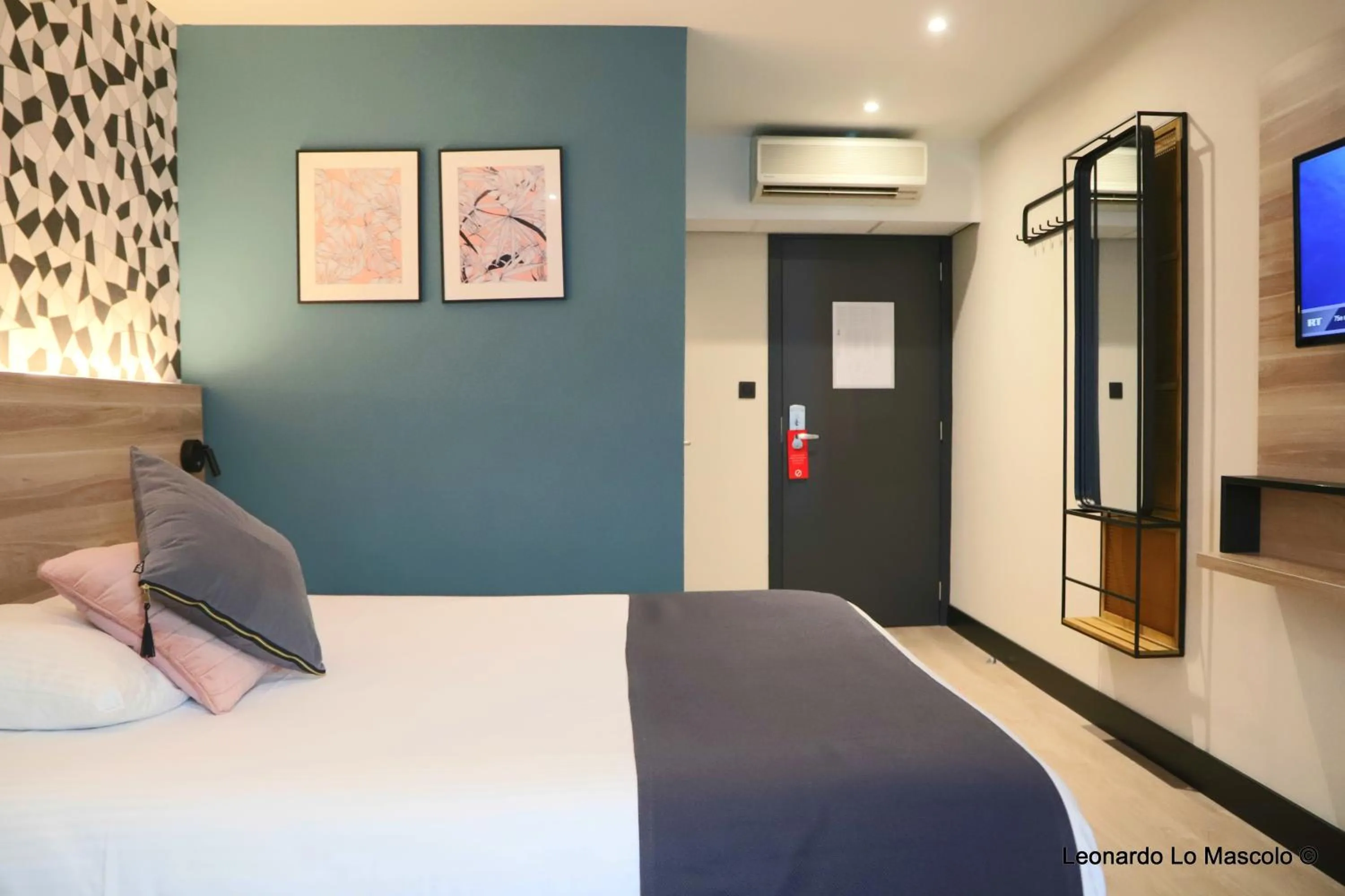 Bed in Hôtel de l'Univers Liège