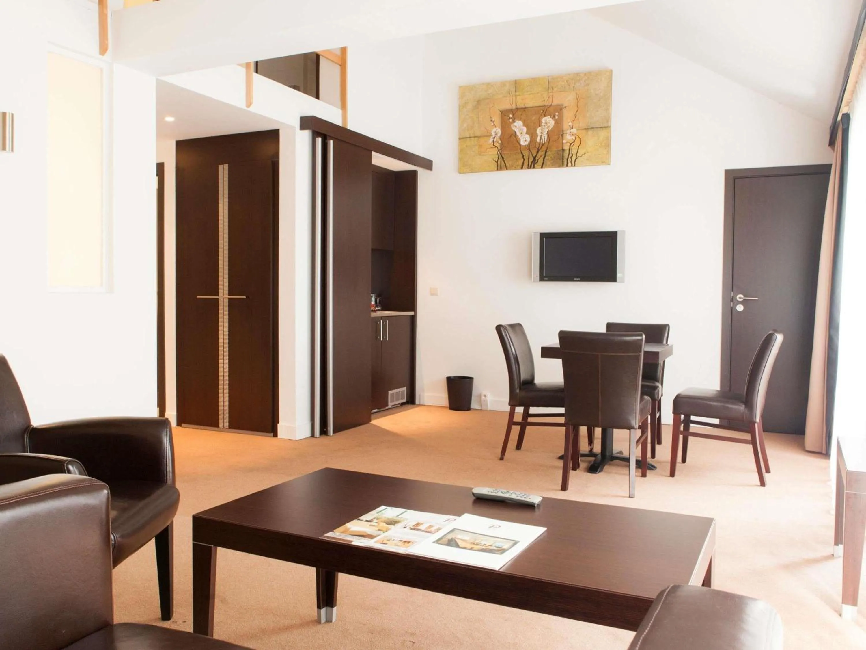 Bedroom in Hotel des Colonies Brussels by Mercure