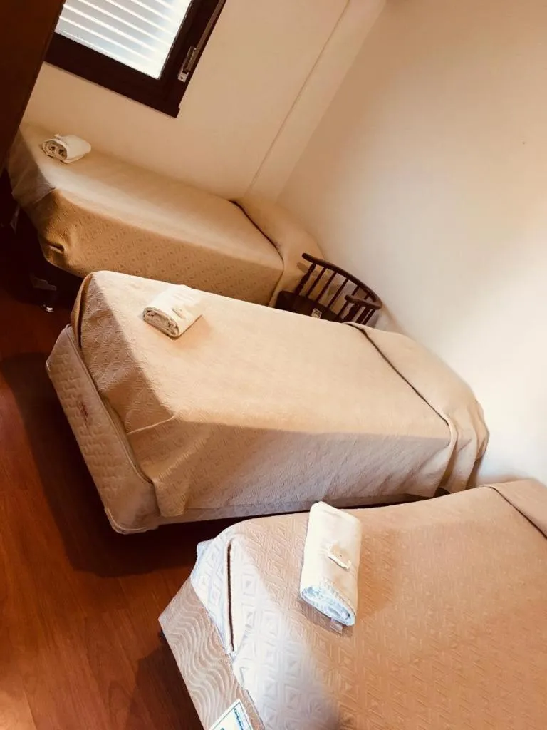 Bed in Porto Rei Residence Hotel