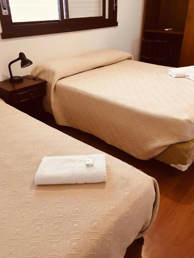 Bed in Porto Rei Residence Hotel
