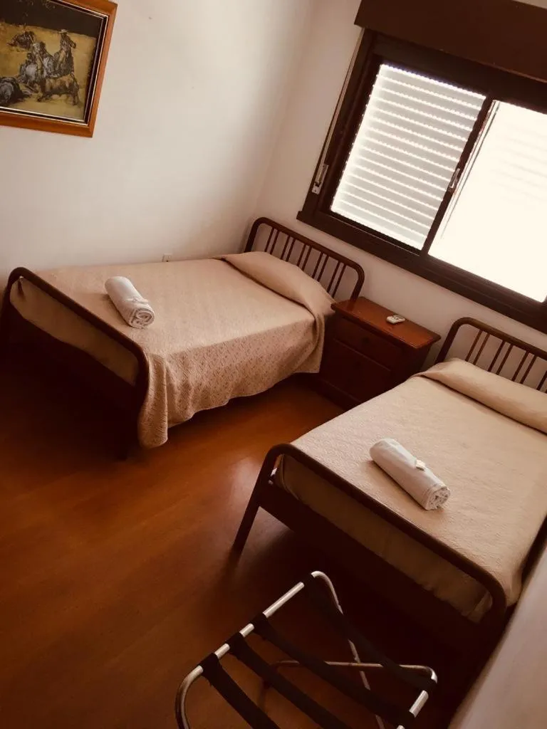 Bed in Porto Rei Residence Hotel