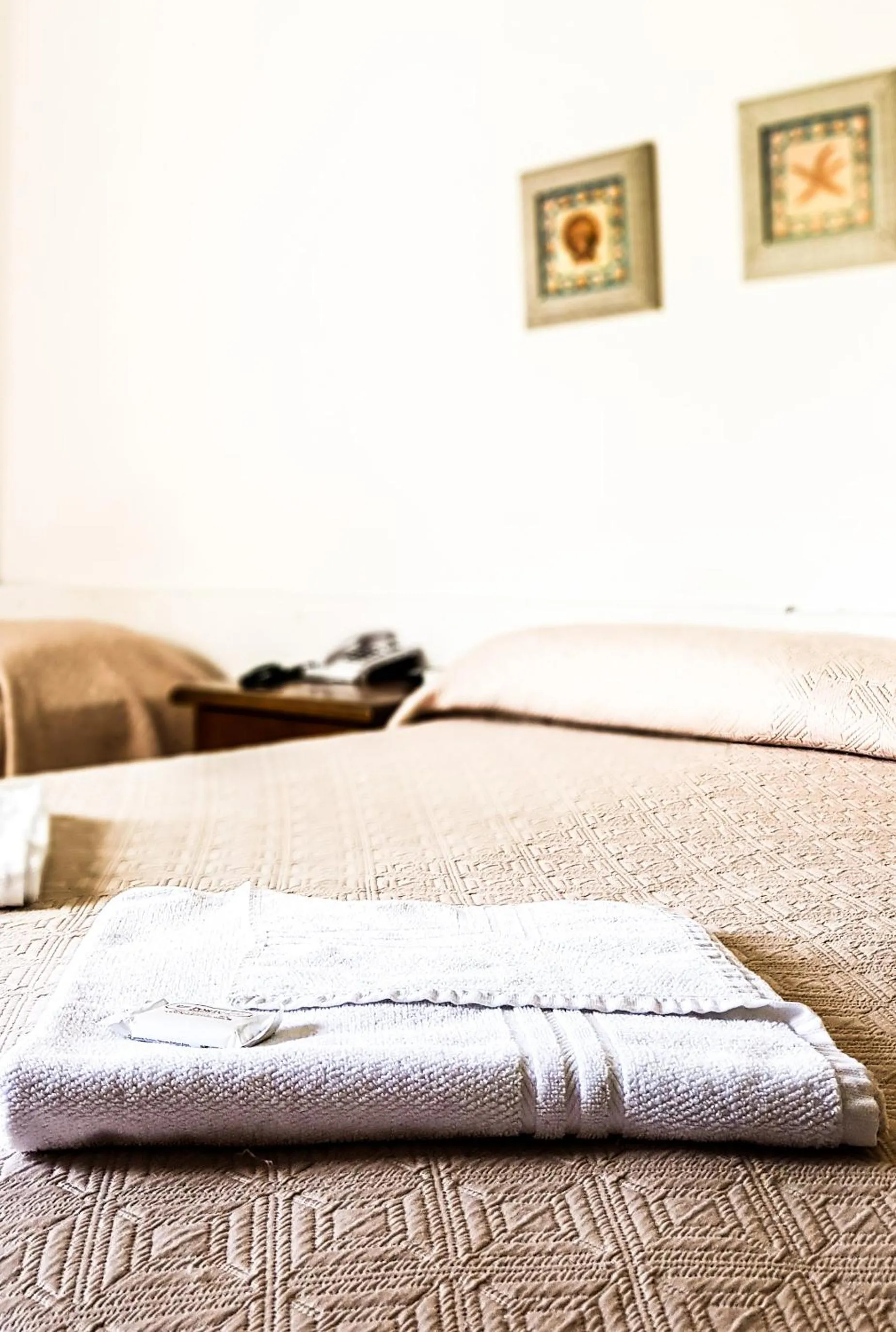 Bed in Porto Rei Residence Hotel