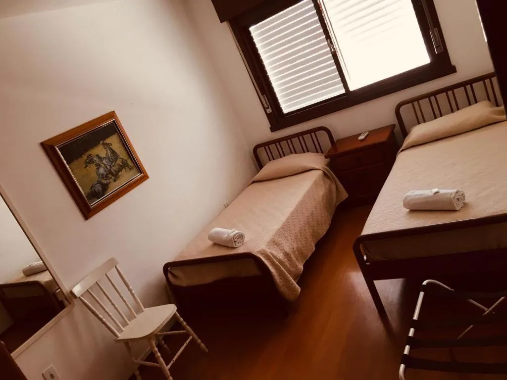 Bed in Porto Rei Residence Hotel