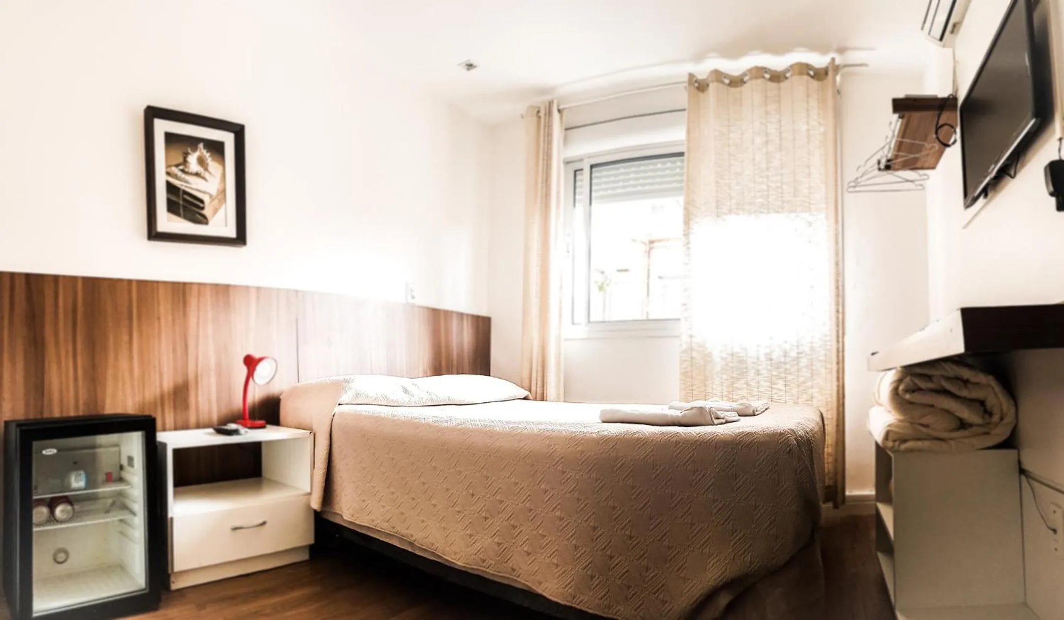 Bed in Porto Rei Residence Hotel