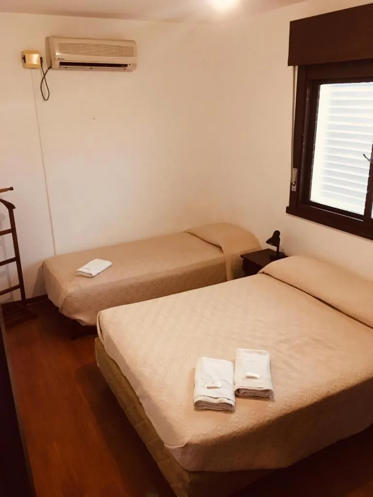 Bed in Porto Rei Residence Hotel