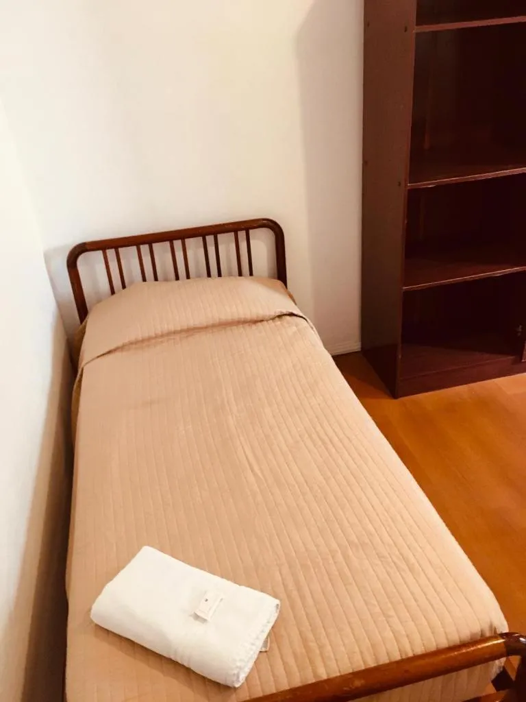 Bed in Porto Rei Residence Hotel