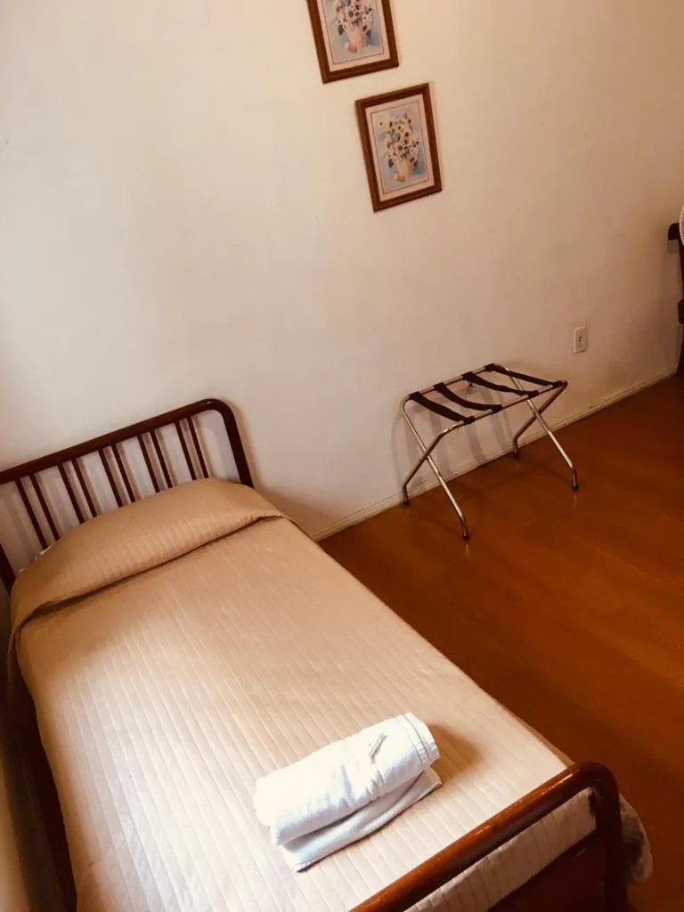 Bed in Porto Rei Residence Hotel
